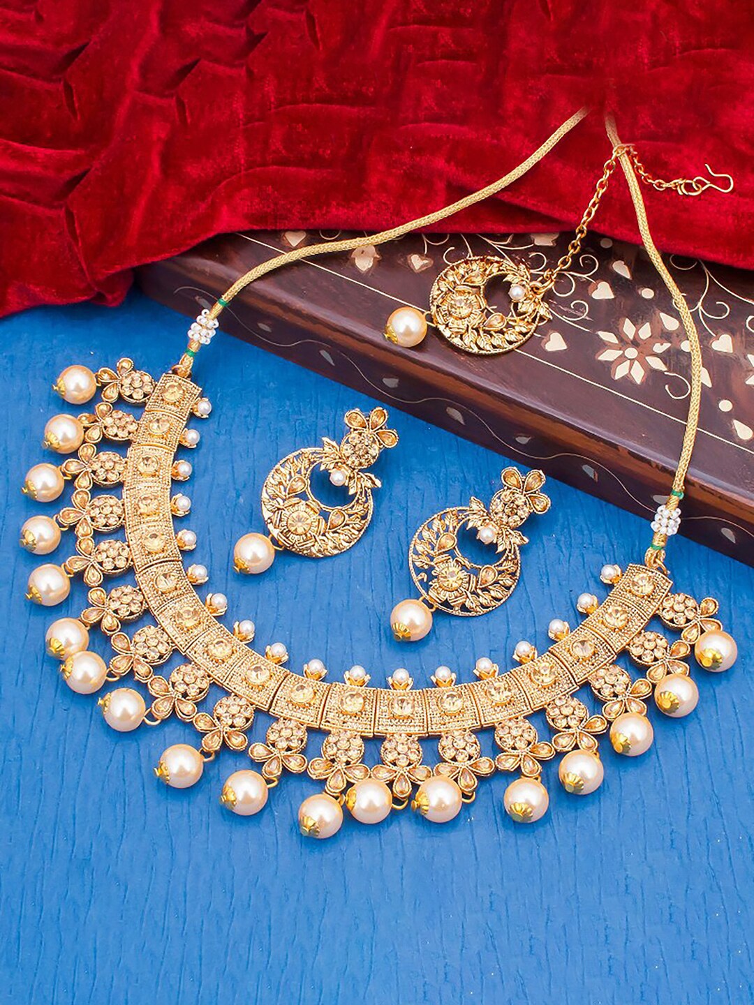 

Sukkhi Gold-Plated Stone-Studded Artificial -Beaded Jewellery Set