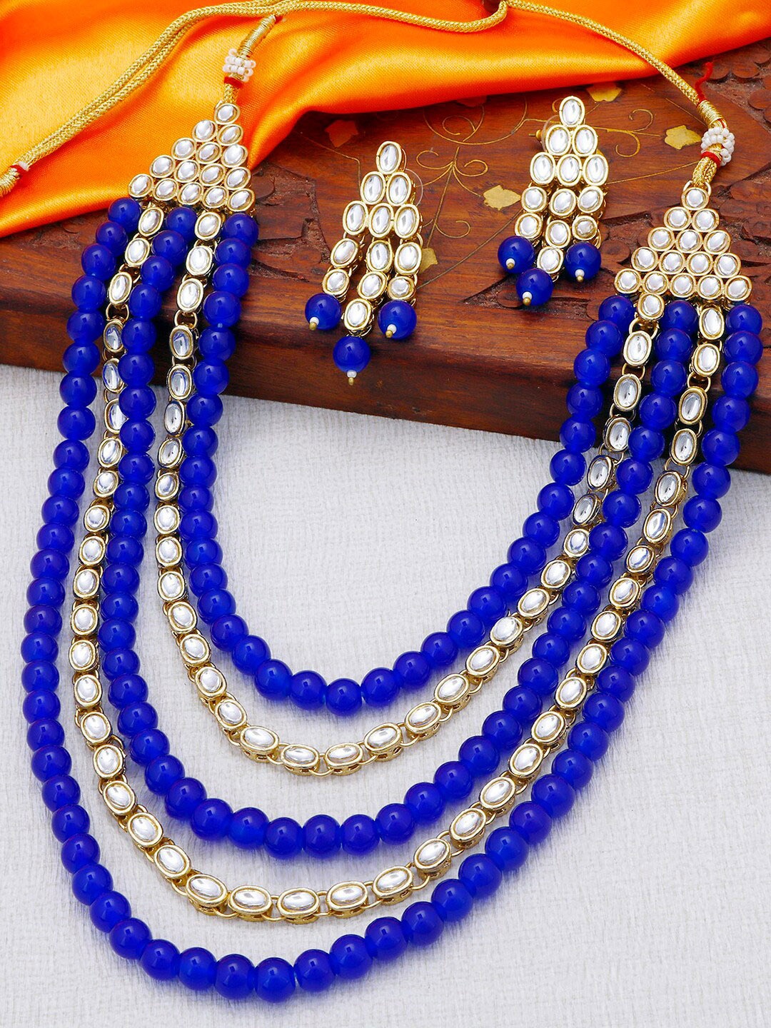 

Sukkhi Gold-Plated Layered Kundan-Studded Necklace & Earrings Set