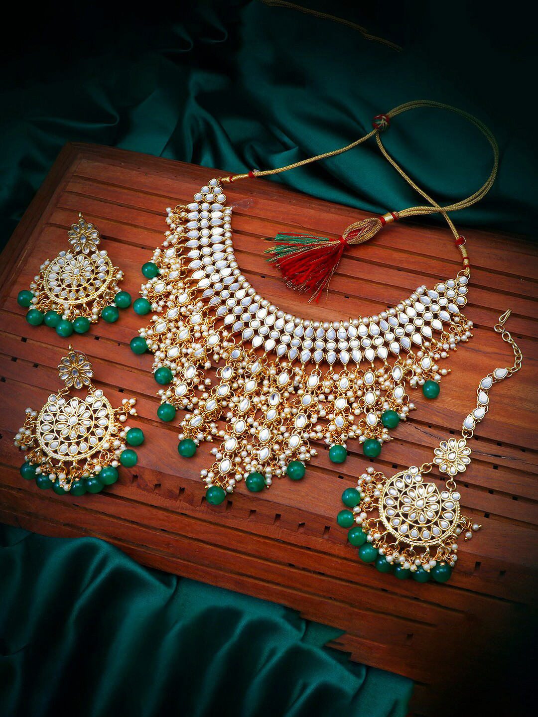 

Sukkhi Gold-Plated Kundan-Studded Necklace and Earrings with Maang Tika