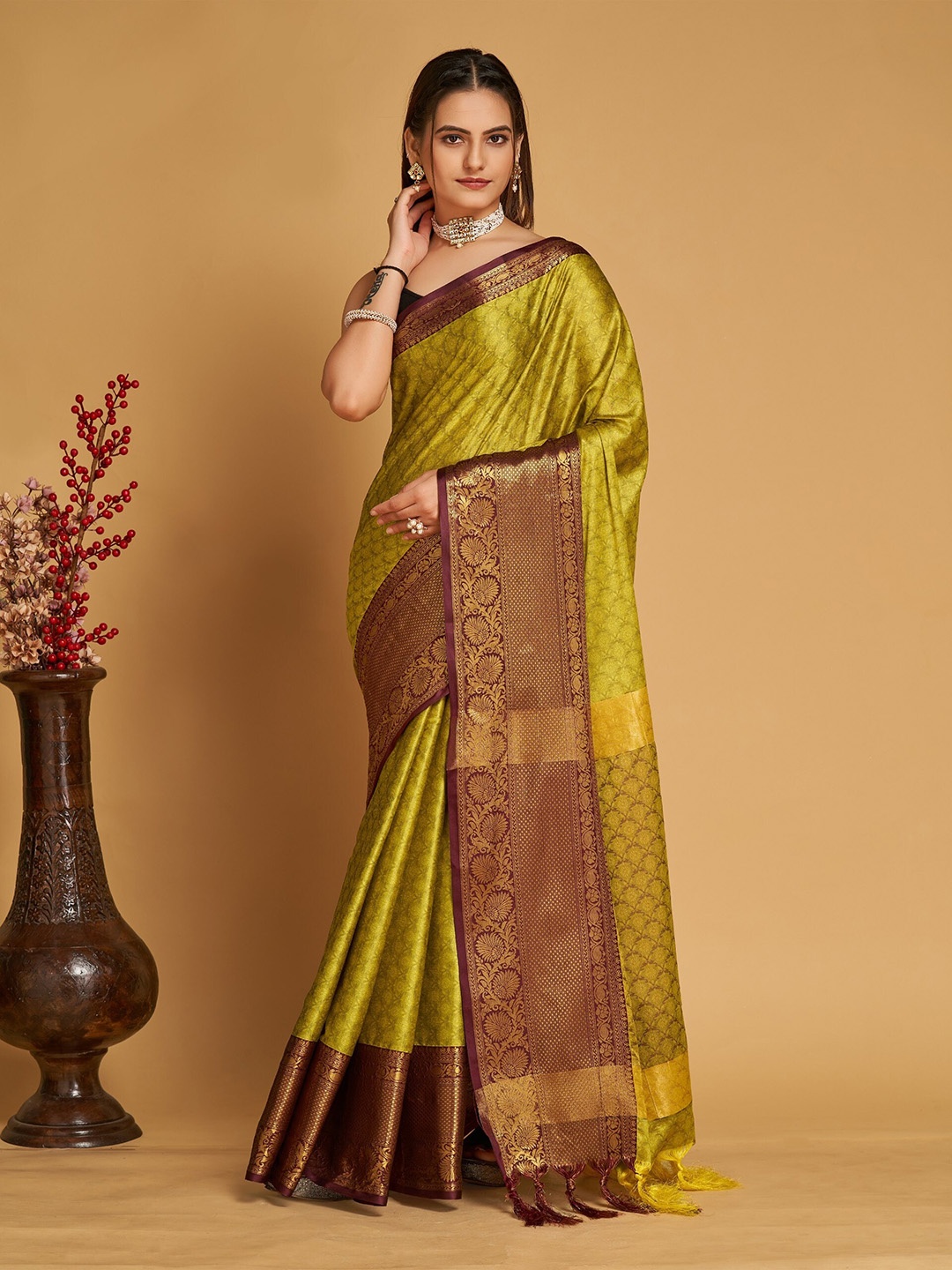 

Mitera Olive Green & Purple Ethnic Motifs Woven Design Zari Silk Cotton Banarasi Saree