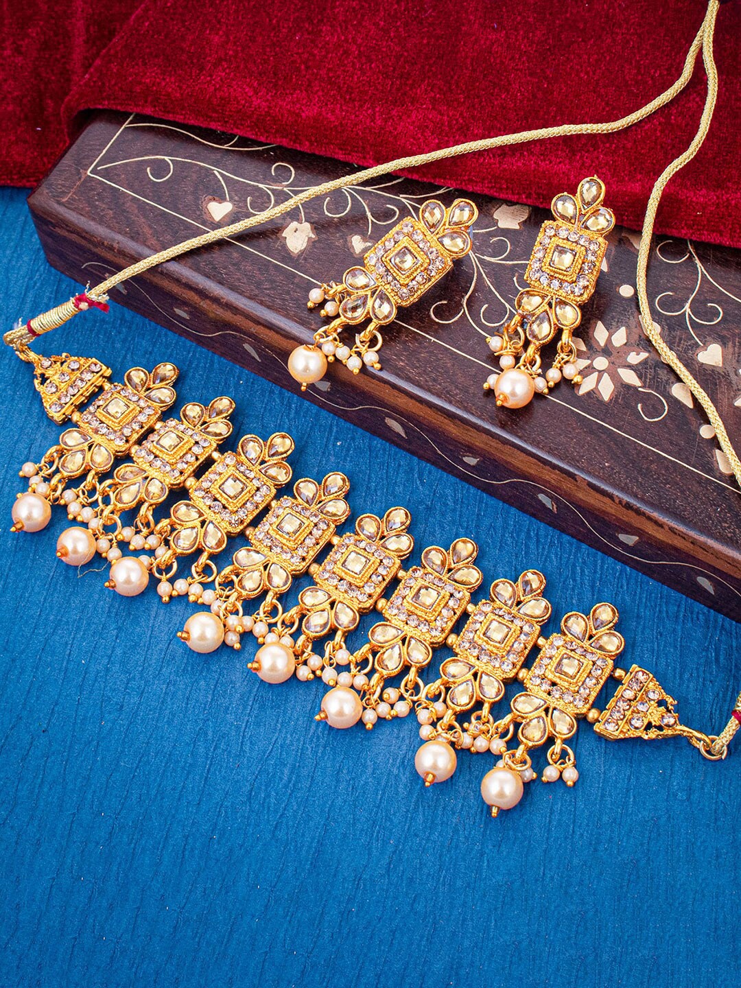 

Sukkhi Gold-Plated Stone-Studded & Pearl Beaded Jewellery Set