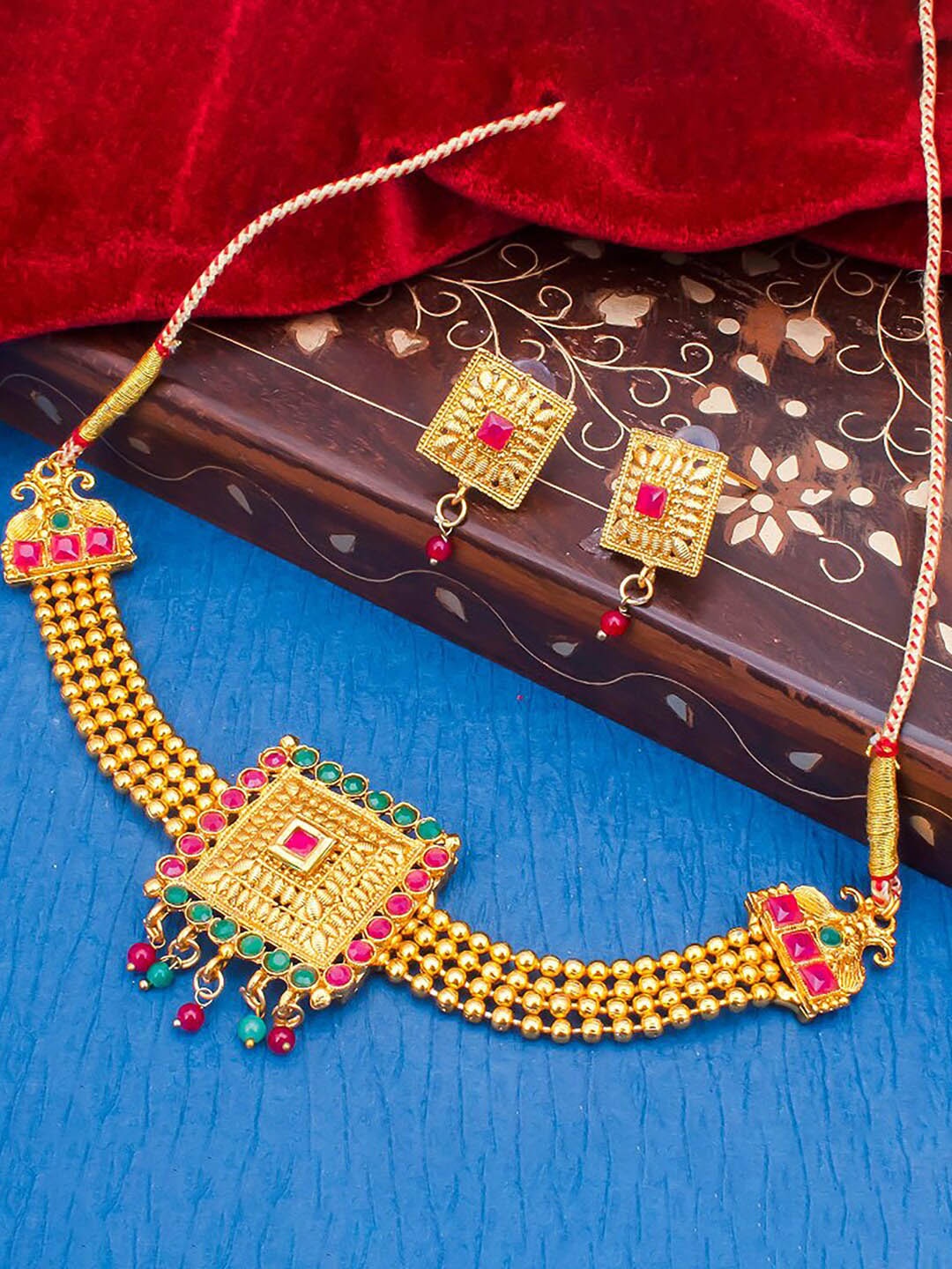 

Sukkhi Gold-Plated Stone Studded & Beaded Jewellery Set