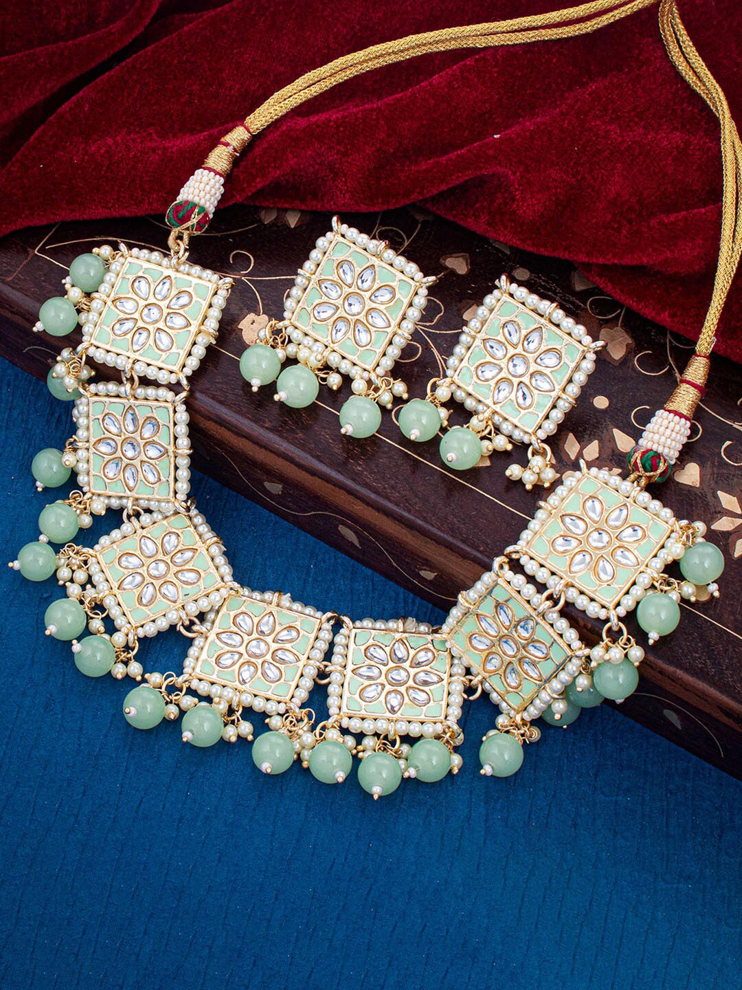 

Sukkhi Gold-Plated Kundan-Studded Pearl-Beaded Jewellery Set