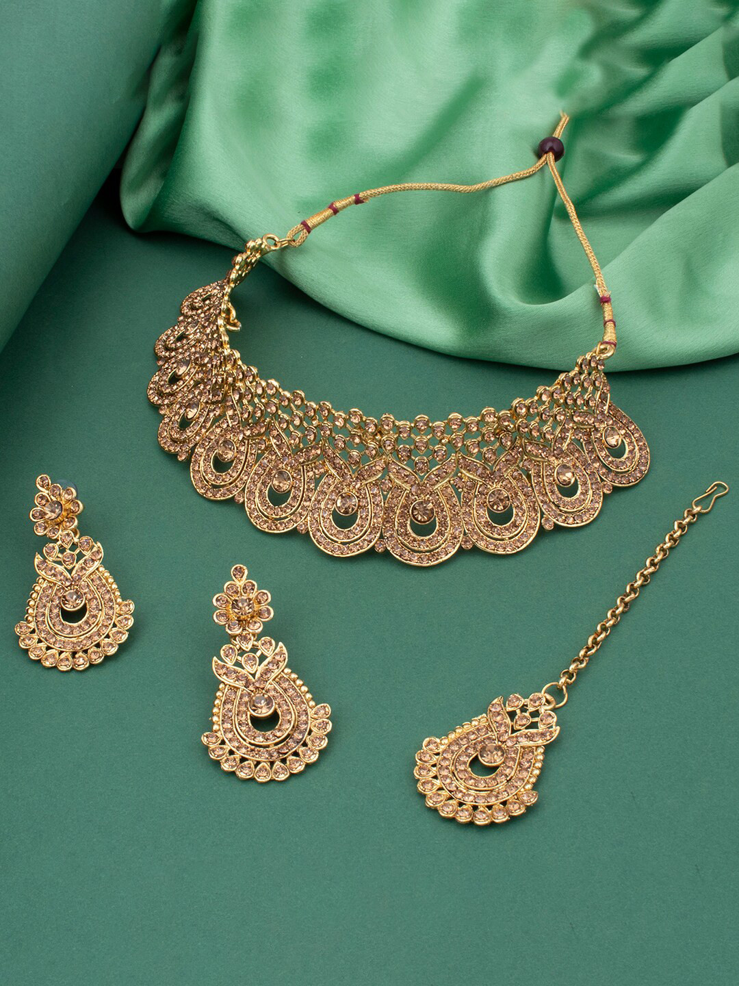 

Sukkhi Gold-Plated Stone-Studded & Beaded Jewellery Set