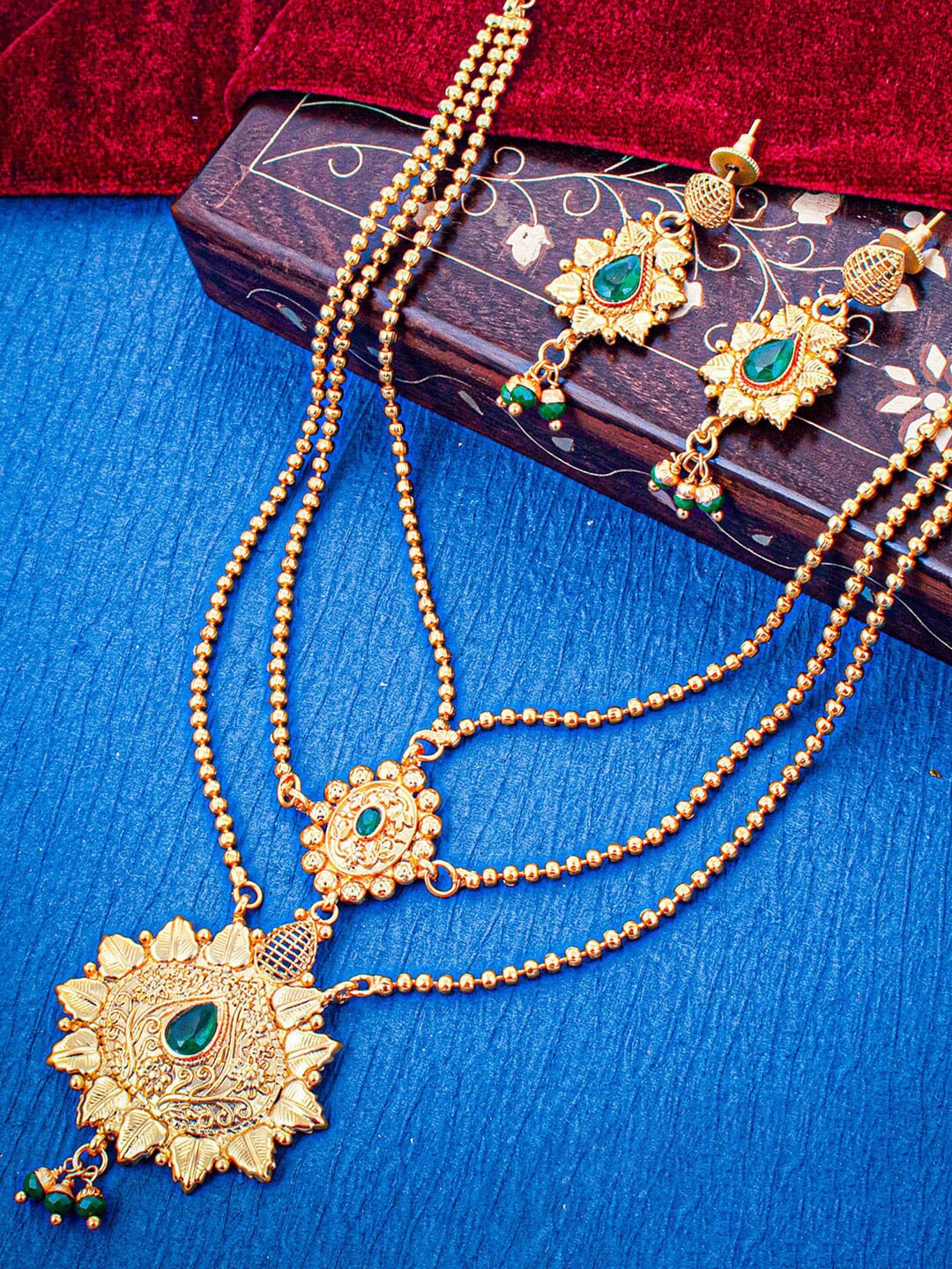 

Sukkhi Gold Plated Layered Artificial Stones and Beads Jewellery Set