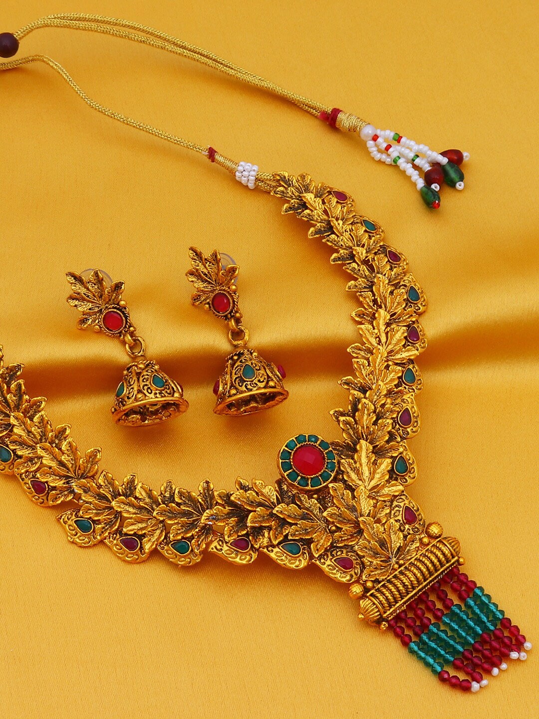 

Sukkhi Gold-Plated Stone-Studded & Beaded Jewellery Set