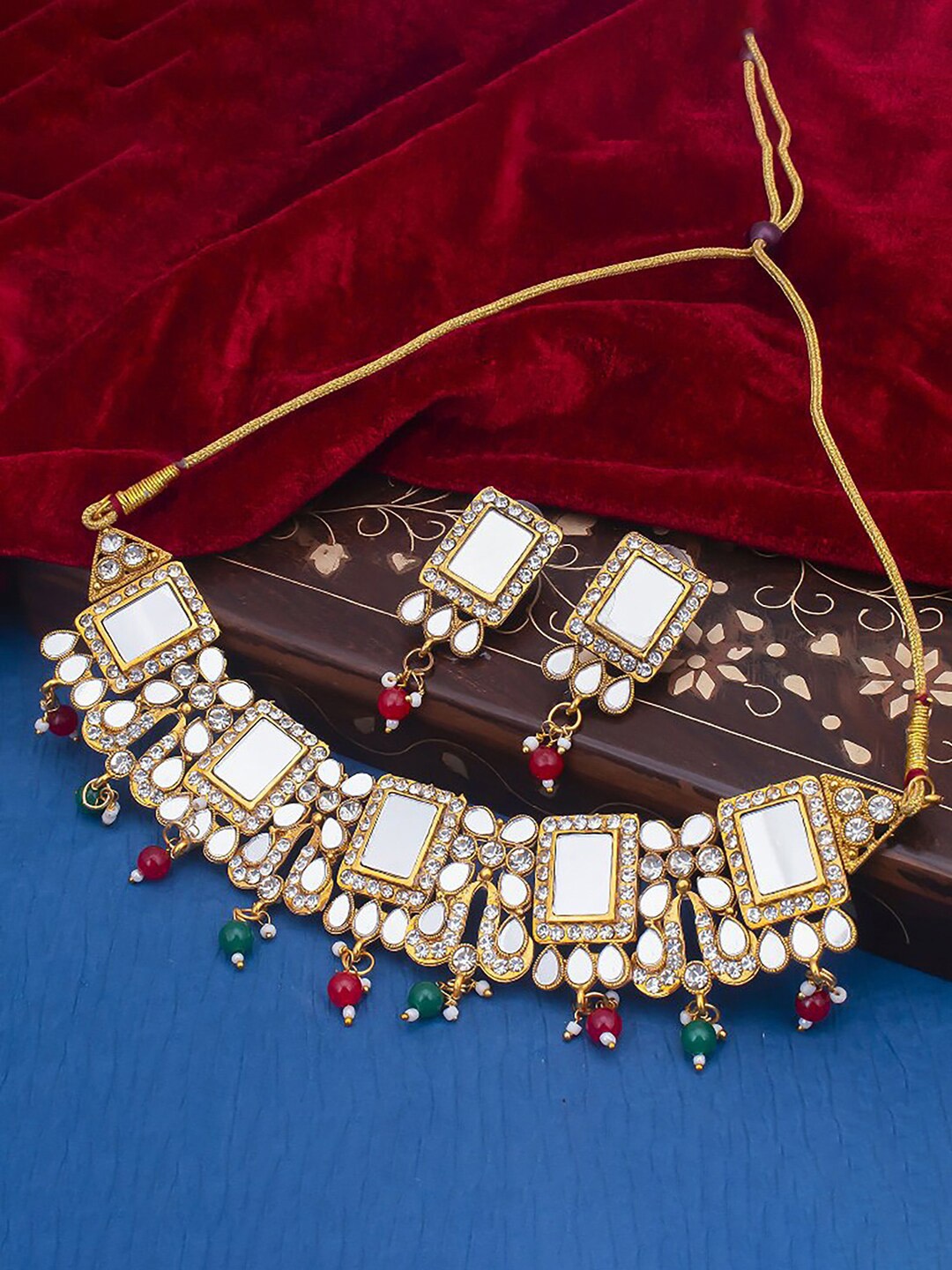 

Sukkhi Gold Plated Stone-Studded & Beaded Necklace and Earrings