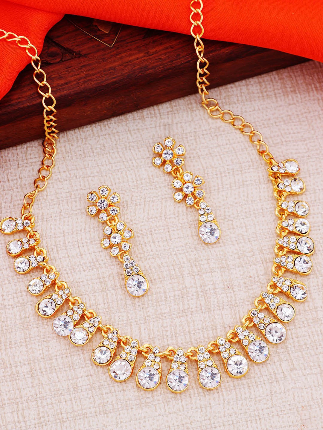

Sukkhi Gold-Plated Stone Studded Necklace and Earrings