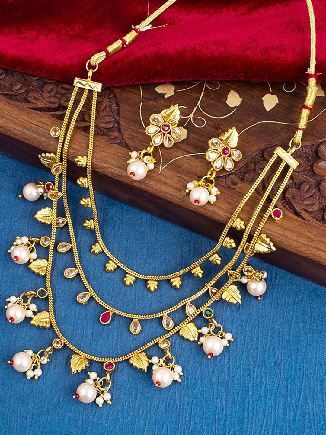 

Sukkhi Gold-Plated Stone Studded & Beaded Jewellery Set