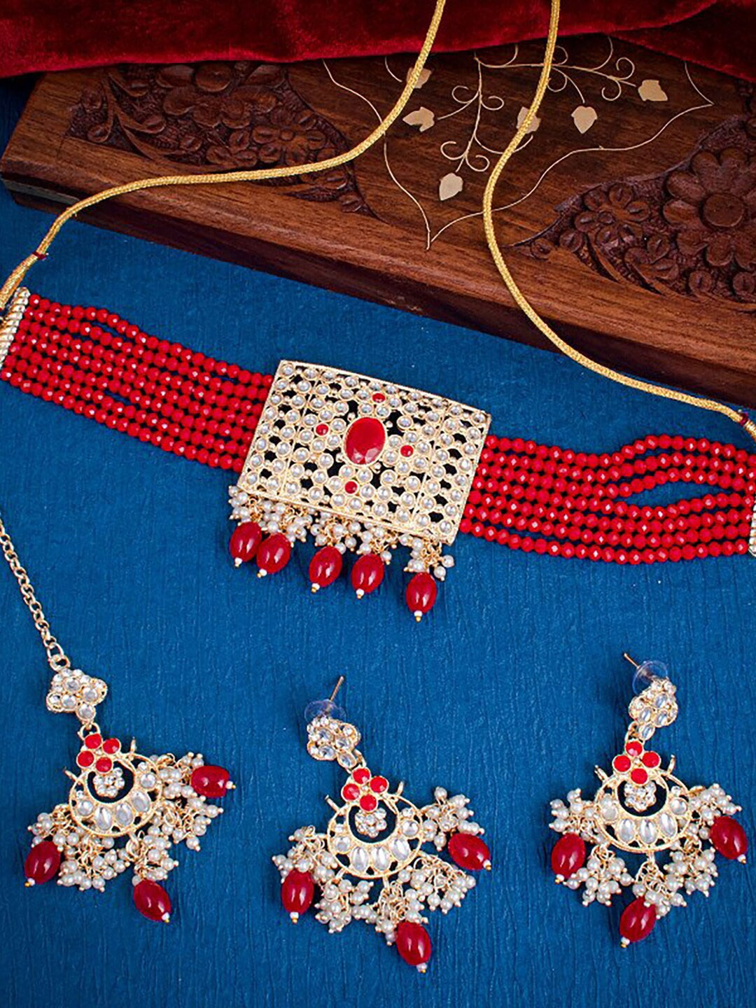 

Sukkhi Gold-Plated Kundan-Studded Necklace and Earrings With Maang Tika Jewellery Set