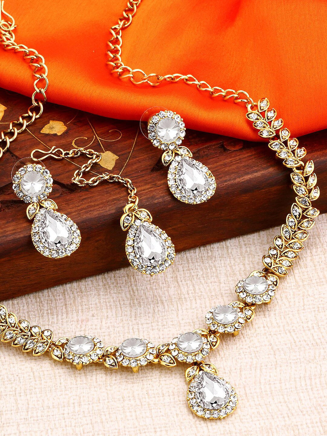 

Sukkhi Gold-Plated AD-Studded Necklace & Earrings