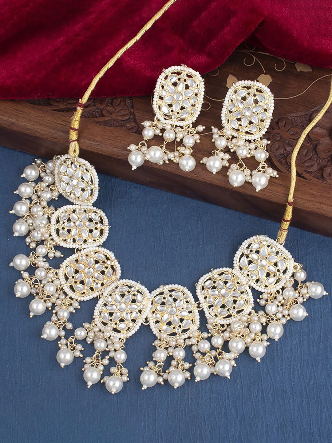 

Sukkhi Gold-Plated Stone Studded & Beaded Jewellery Set