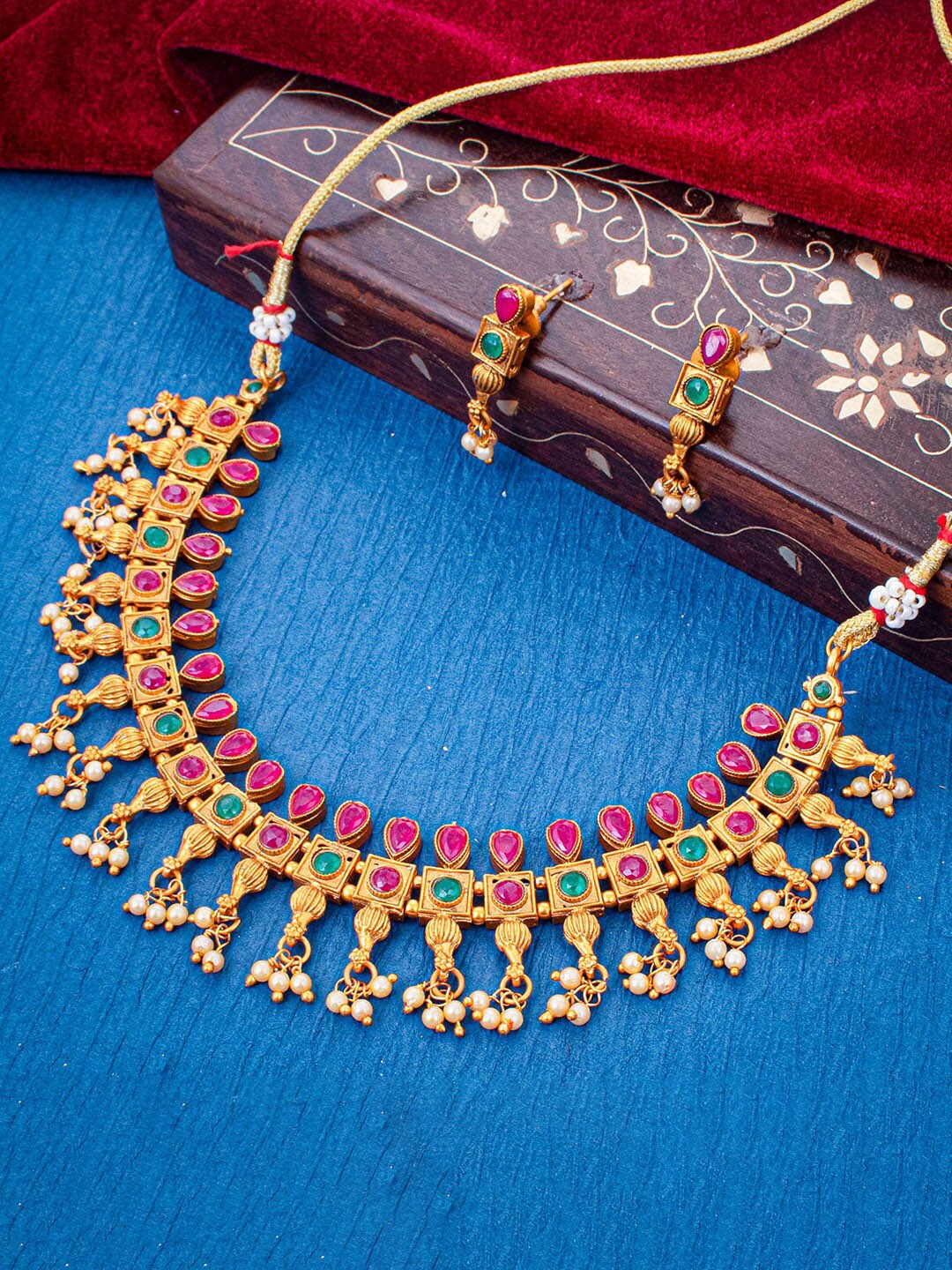 

Sukkhi Gold-Plated Stone Studded & Beaded Necklace and Earrings