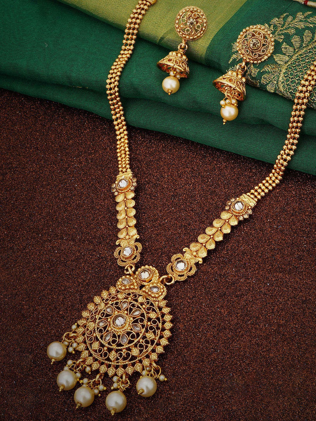 

Sukkhi Gold-Plated Stone Studded & Beaded Jewellery Set