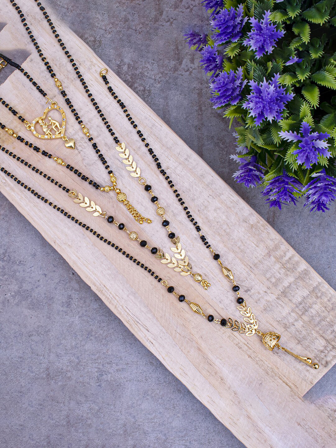 

Sukkhi Set Of 4 Gold-Plated Stone-Studded And Beaded Mangalsutras