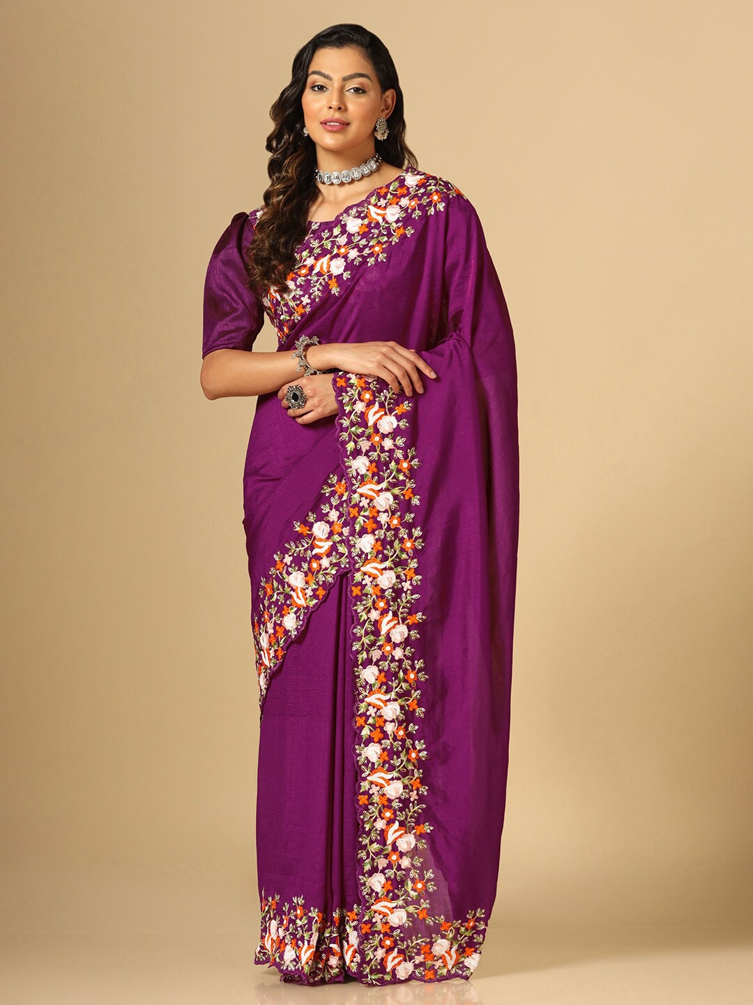 

Satrani Purple & Orange Embroidered Saree