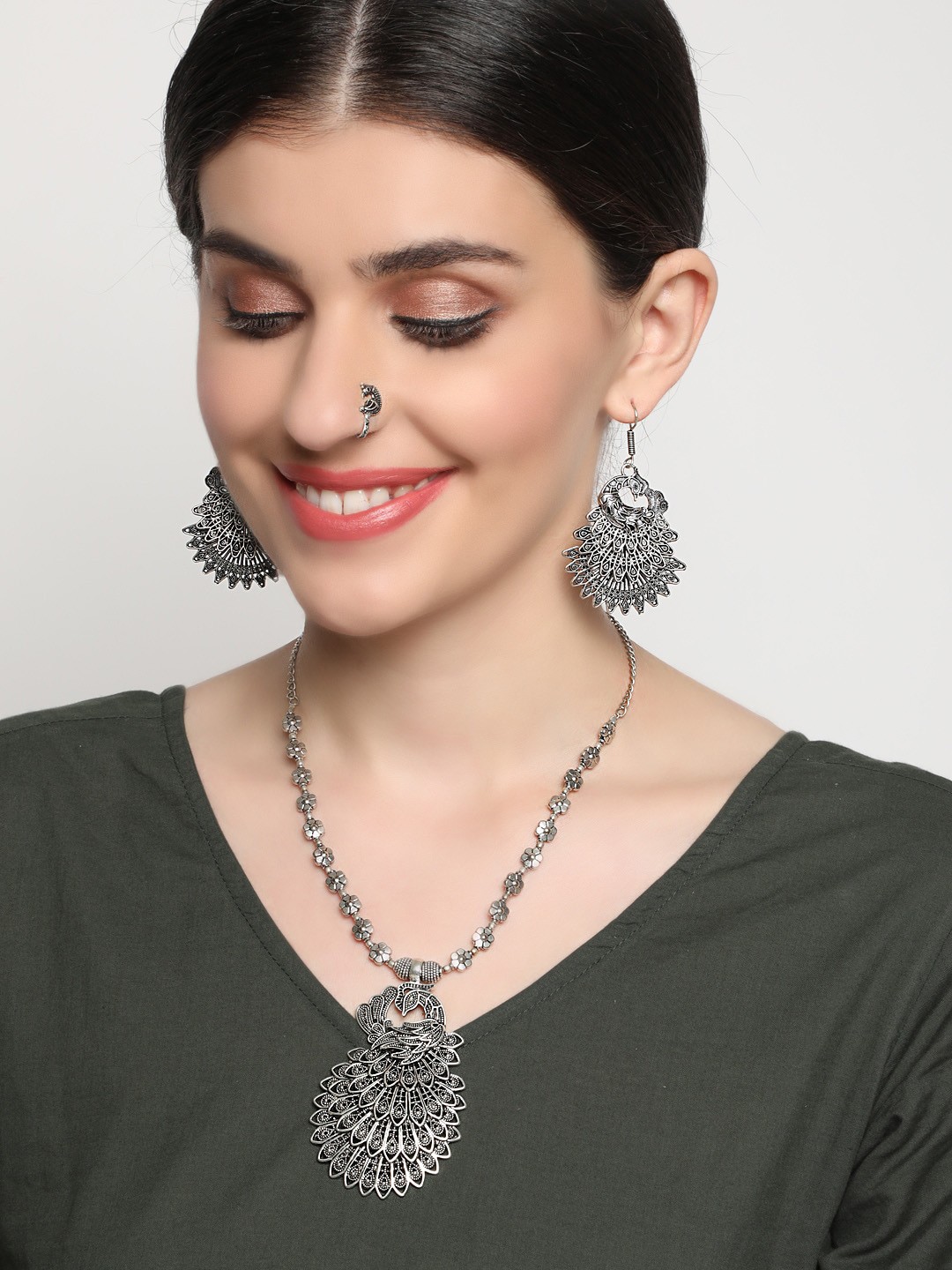 

Sangria Silver-Plated Peacock Shaped Oxidized Jewellery Set