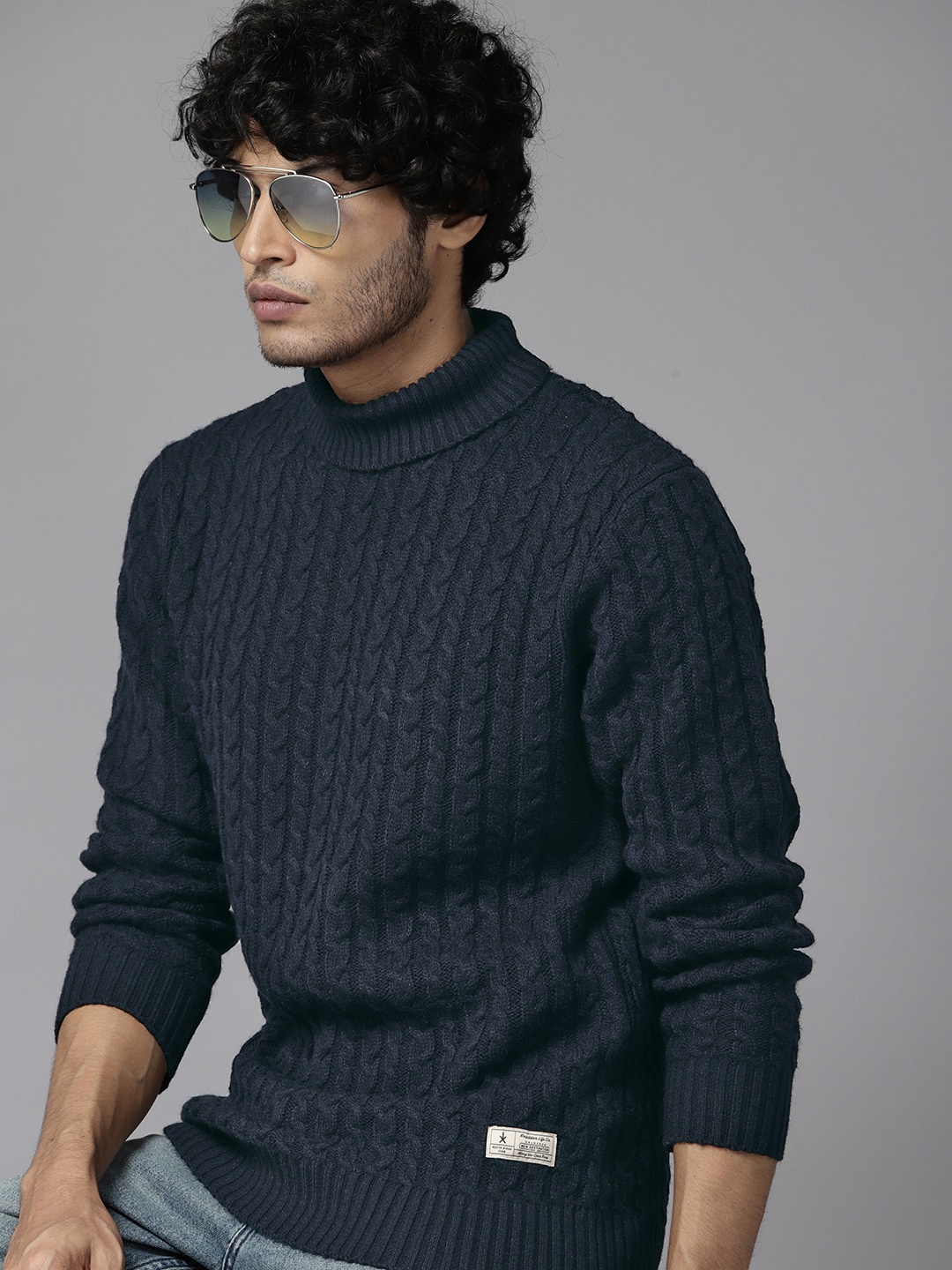 

The Roadster Lifestyle Co. Men Acrylic Turtle Neck Cable Knit Pullover, Navy blue
