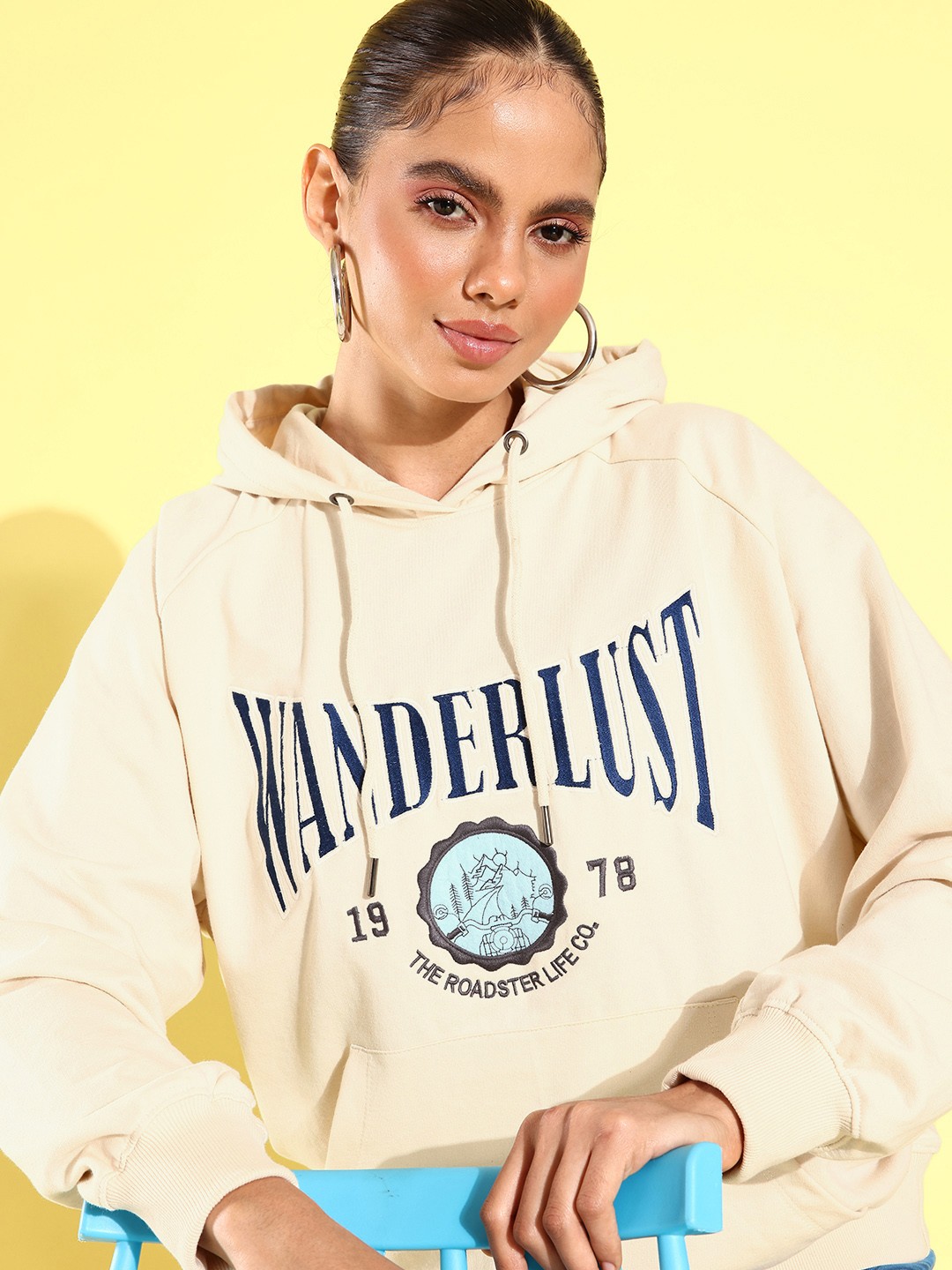 

The Roadster Lifestyle Co. Women Printed Hooded Sweatshirt, Cream