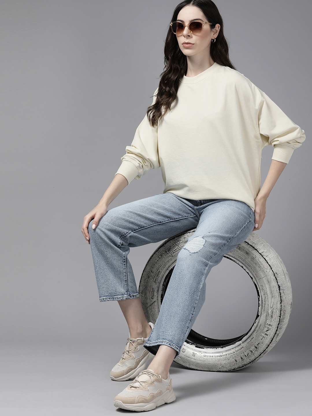 

The Roadster Lifestyle Co. Women Oversized Drop-Shoulder Sleeves Solid Longline Sweatshirt, Cream