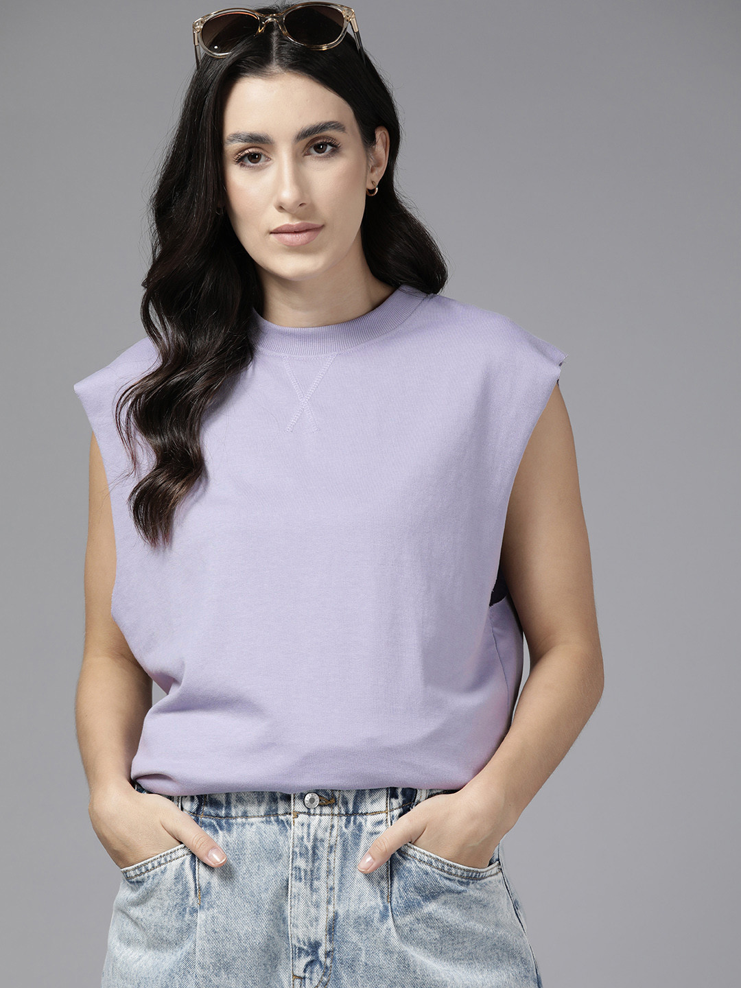 

The Roadster Lifestyle Co. Women Sleeveless Longline Solid Sweatshirt, Lavender