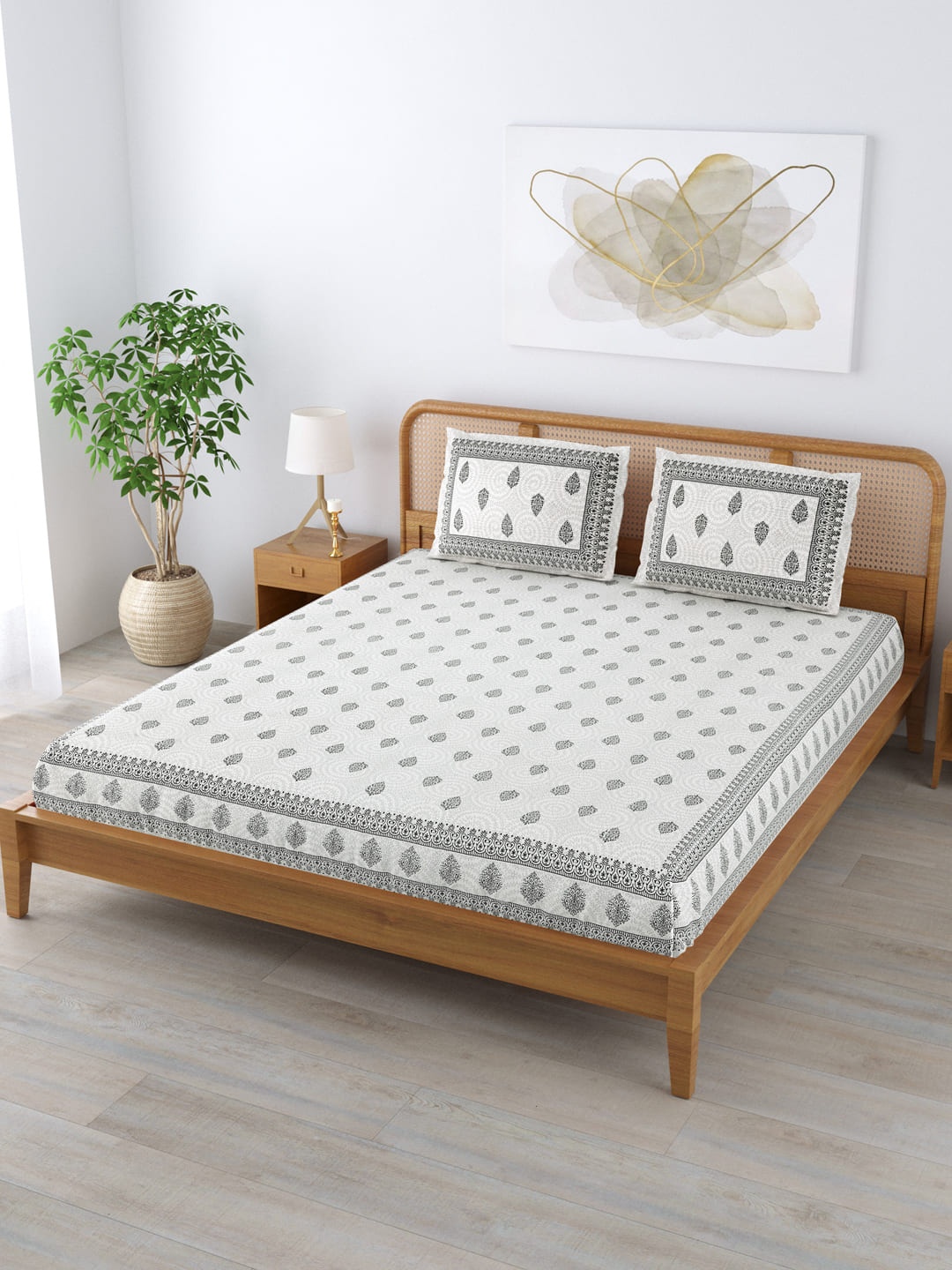 

Clasiko White & Black Ethnic Motifs Cotton 210 TC King Bedsheet With 2 Pillow Covers