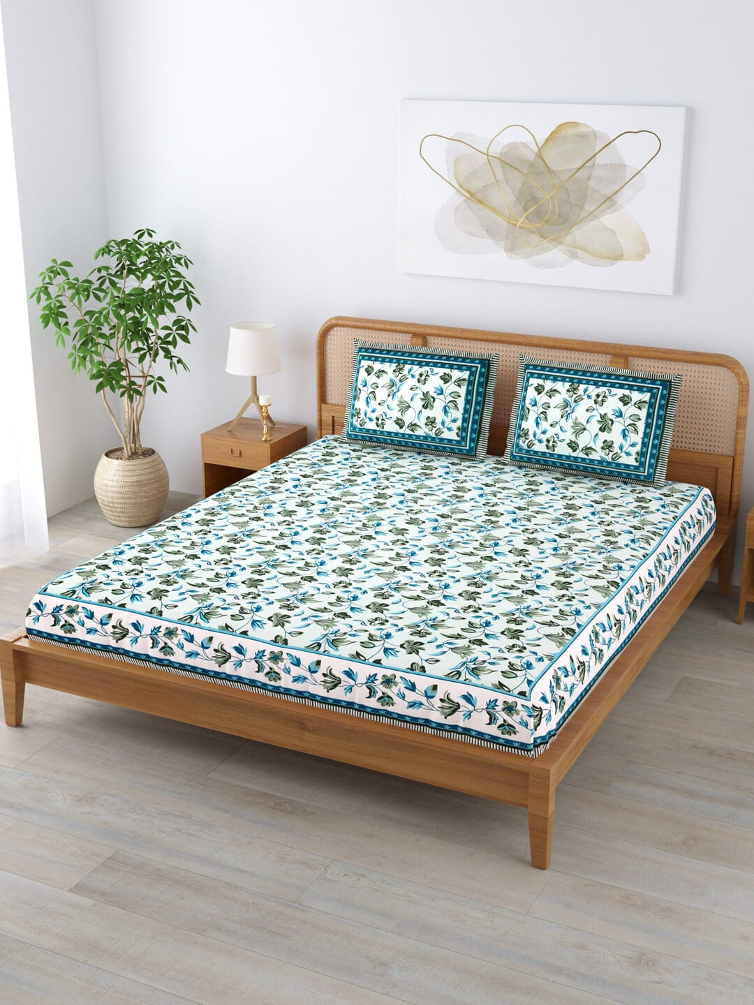 

Clasiko White & Blue Floral Cotton 210 TC King Bedsheet With 2 Pillow Covers