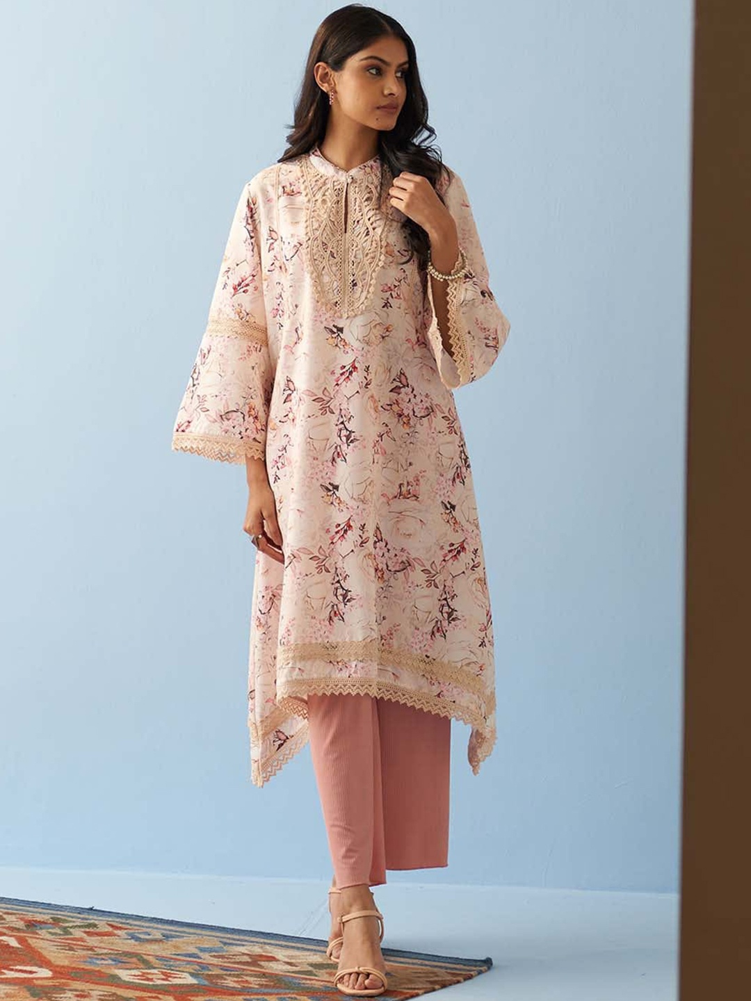 

Lakshita Floral Printed Band Collar Flared Sleeves Pure Cotton Asymmetric Kurta, Peach