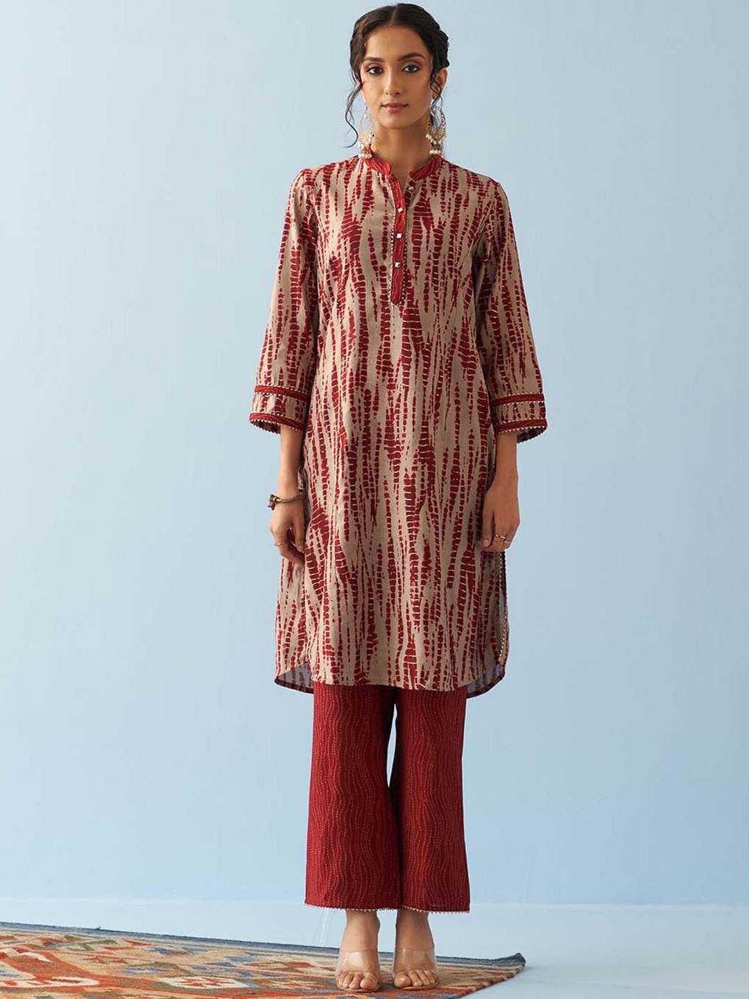 

Lakshita Abstract Printed Regular Kurta with Trousers, Maroon