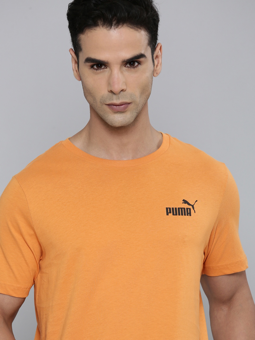 

Puma Men Solid Essentials Small Logo Regular Fit Outdoor T-shirt, Mustard