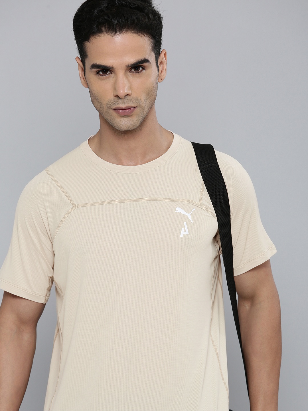 

Puma Men Solid Round Neck Seasons Cool Cell Running T-shirt, Beige
