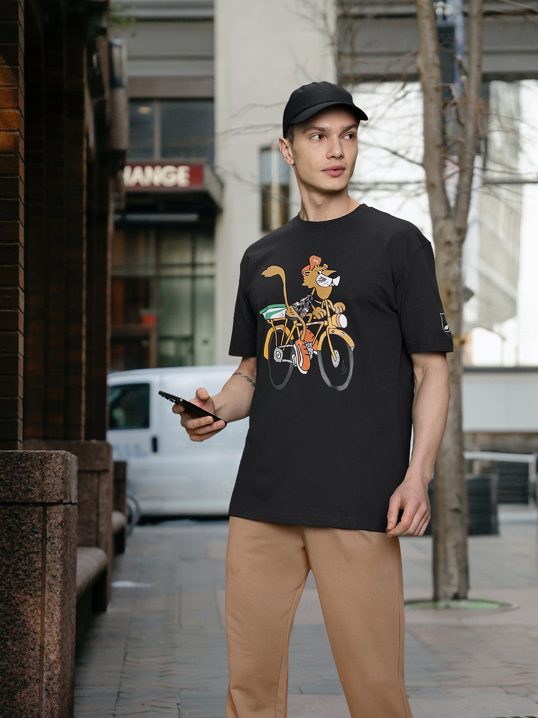 

Puma Men UPTOWN Chester Cheetah Graphic Printed T-shirt, Black