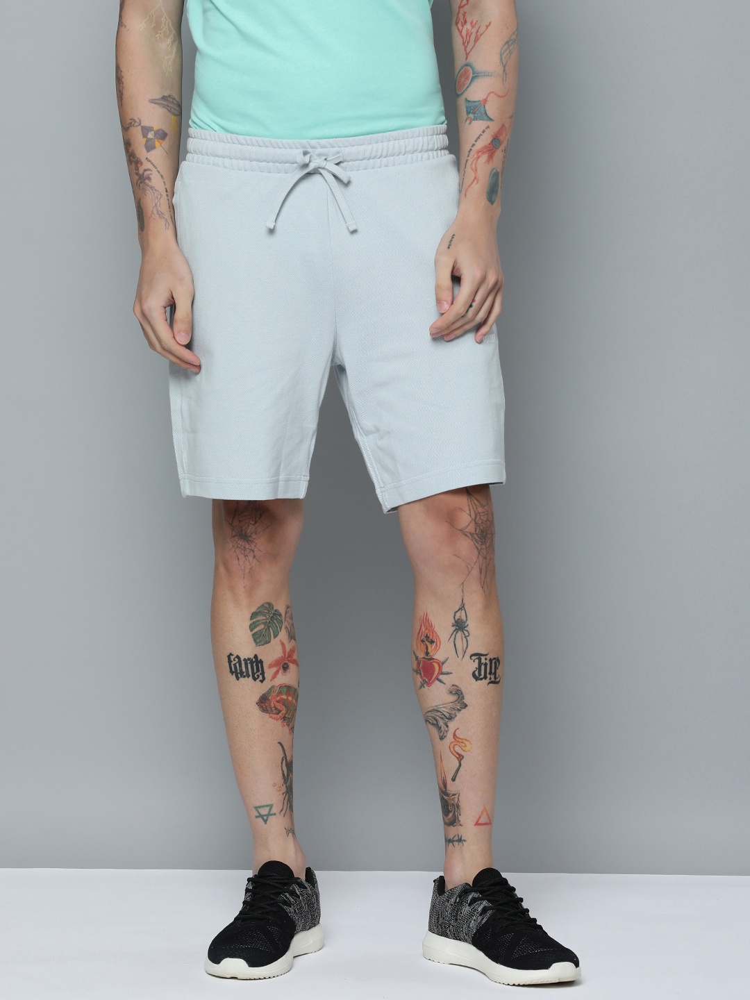 

Puma Men Pure Cotton Classics Regular fit Pintuck 8" Sustainable Shorts, Grey