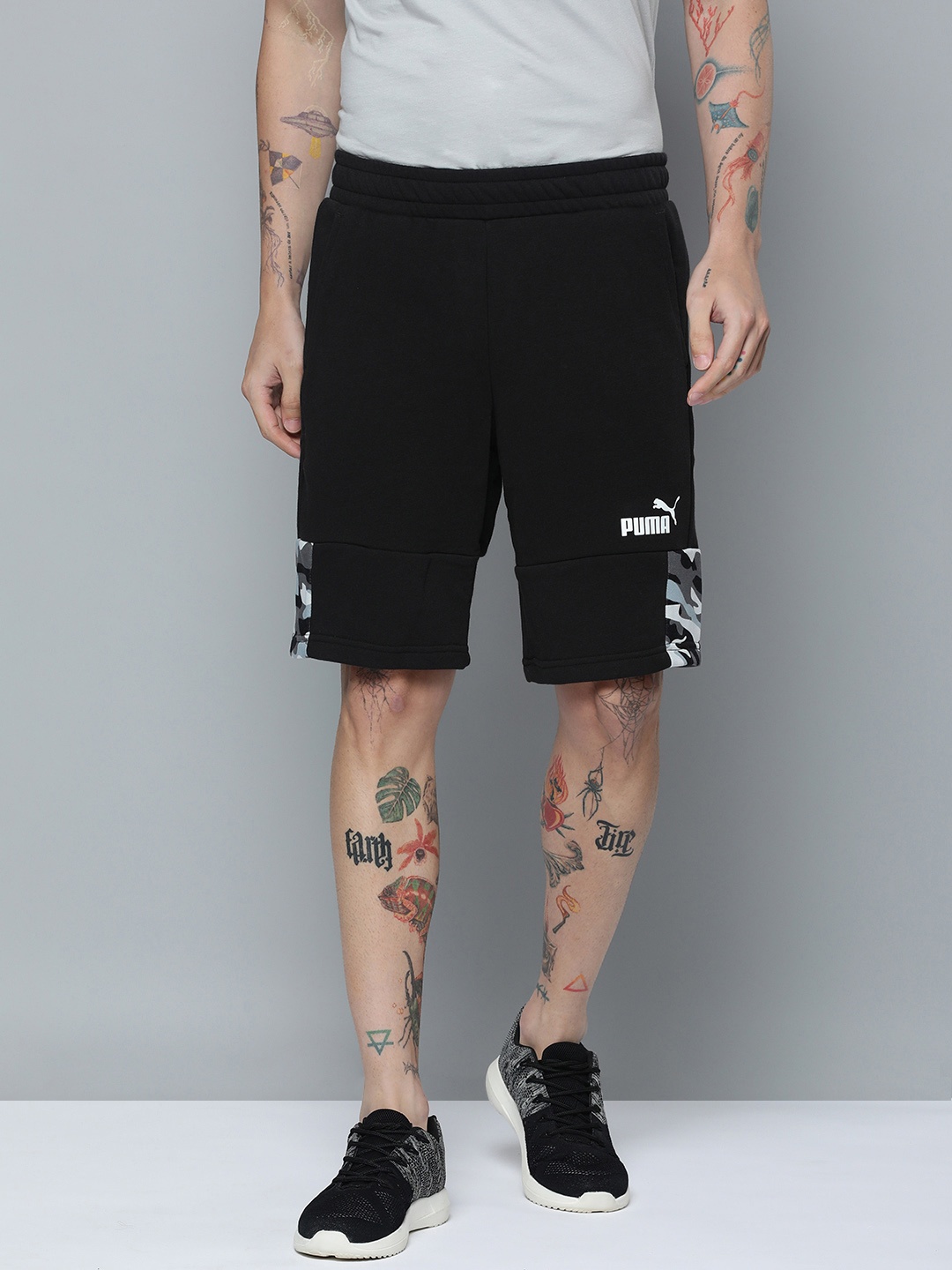 

Puma Men Mid-Rise Essential Block Camouflage Printed Regular fit Outdoor Shorts, Black