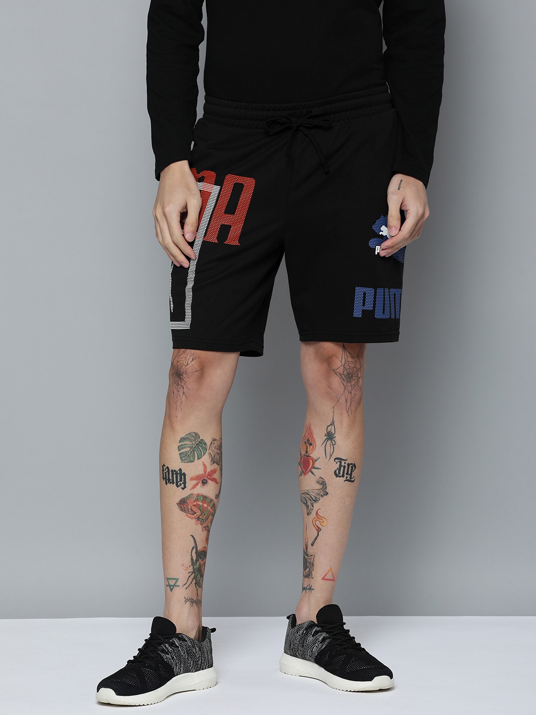 

Puma Men Brand Logo Print Regular Fit Mid-Rise Classics Gen. 8" Sports Shorts, Black