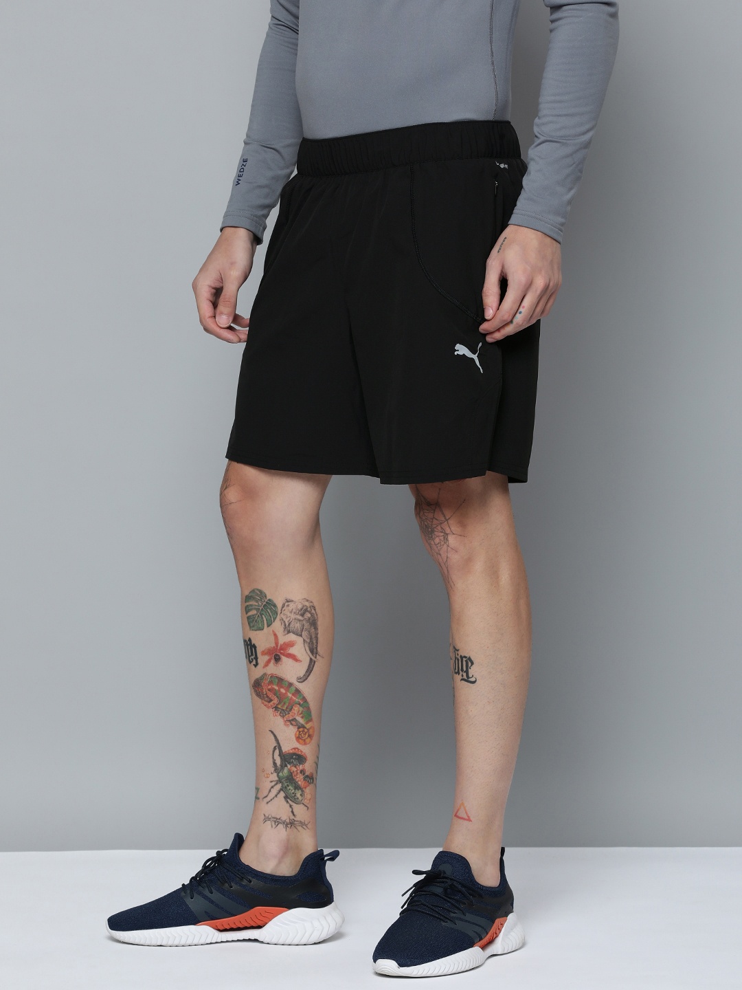 

Puma Men Solid Regular Fit High-Rise Run Ultraweave 7" Running Shorts, Black