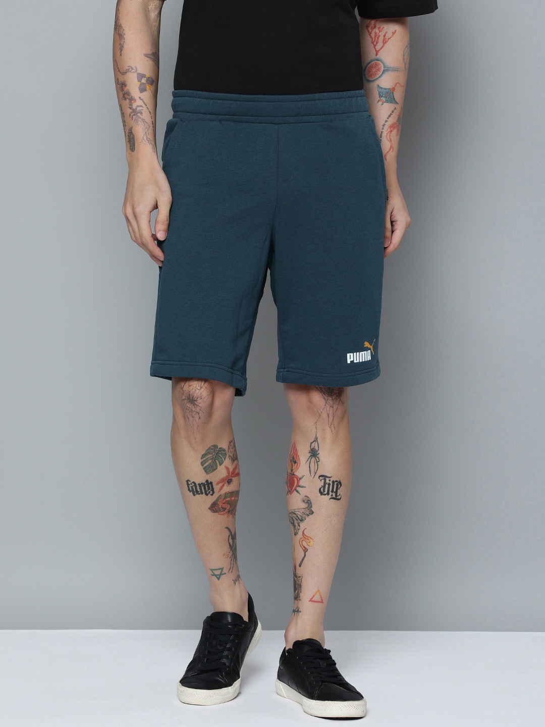 

Puma Men Solid Essentials+ Two-Tone Mid-Rise Sport Shorts, Teal