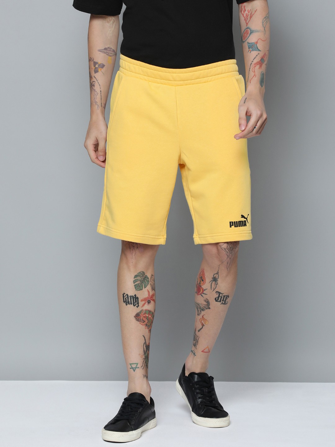 

Puma Men Solid Essentials Mid-Rise Sport Shorts, Yellow