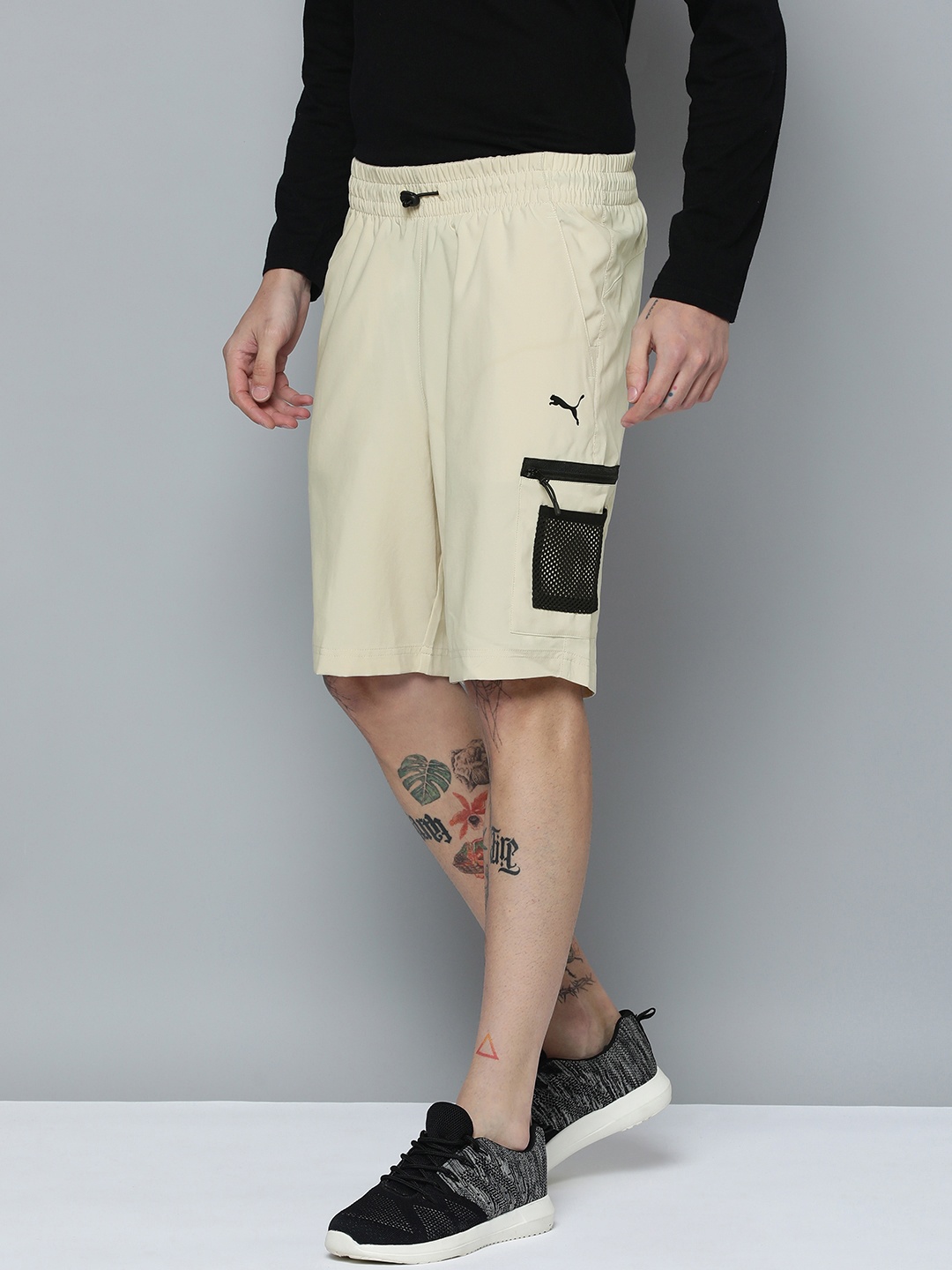 

Puma Men dryCELL OPEN ROAD Regular Fit Woven Shorts, Off white