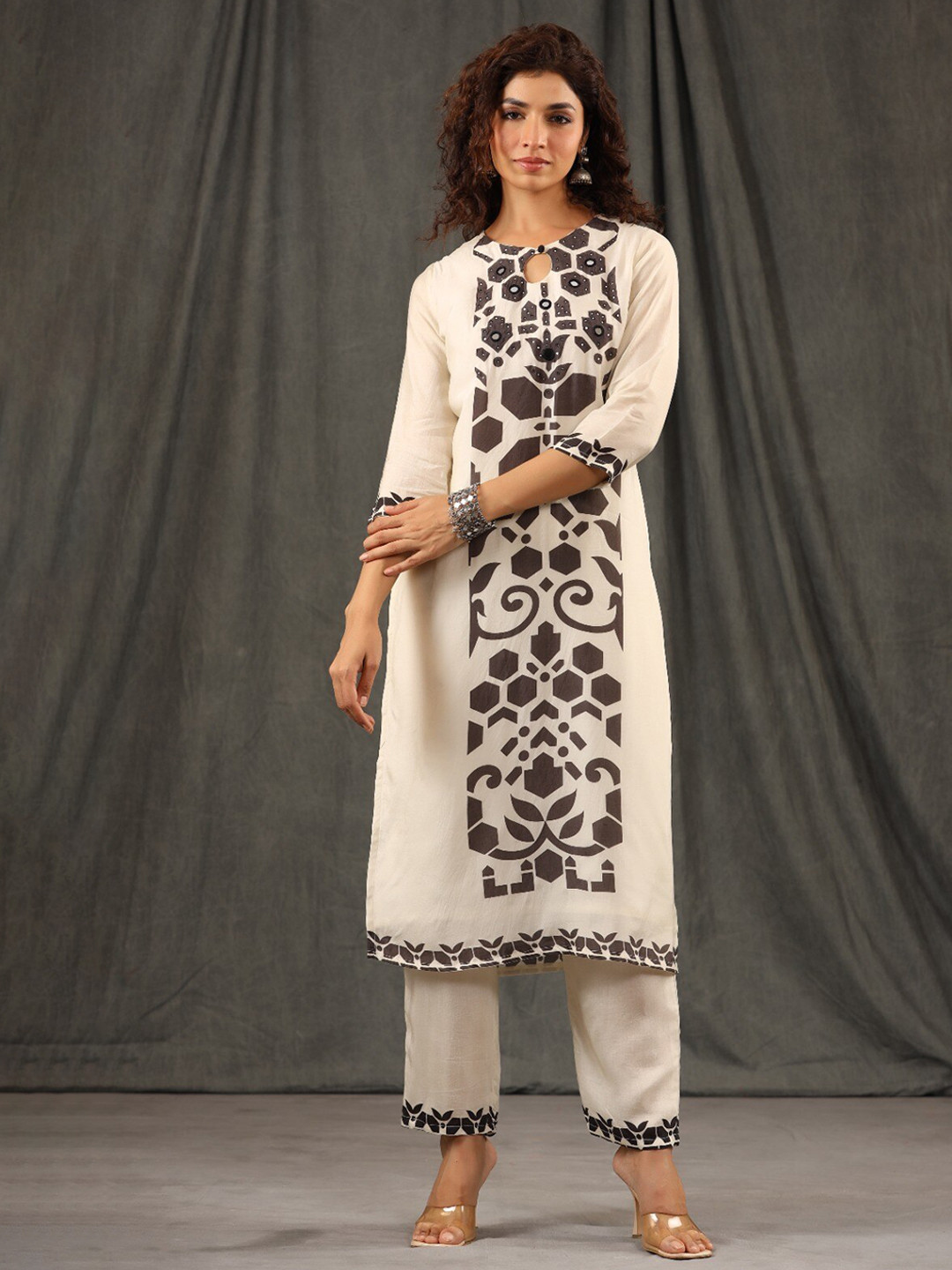 

Meena Bazaar Geometric Printed Mirror Work Kurta with Trousers, Cream