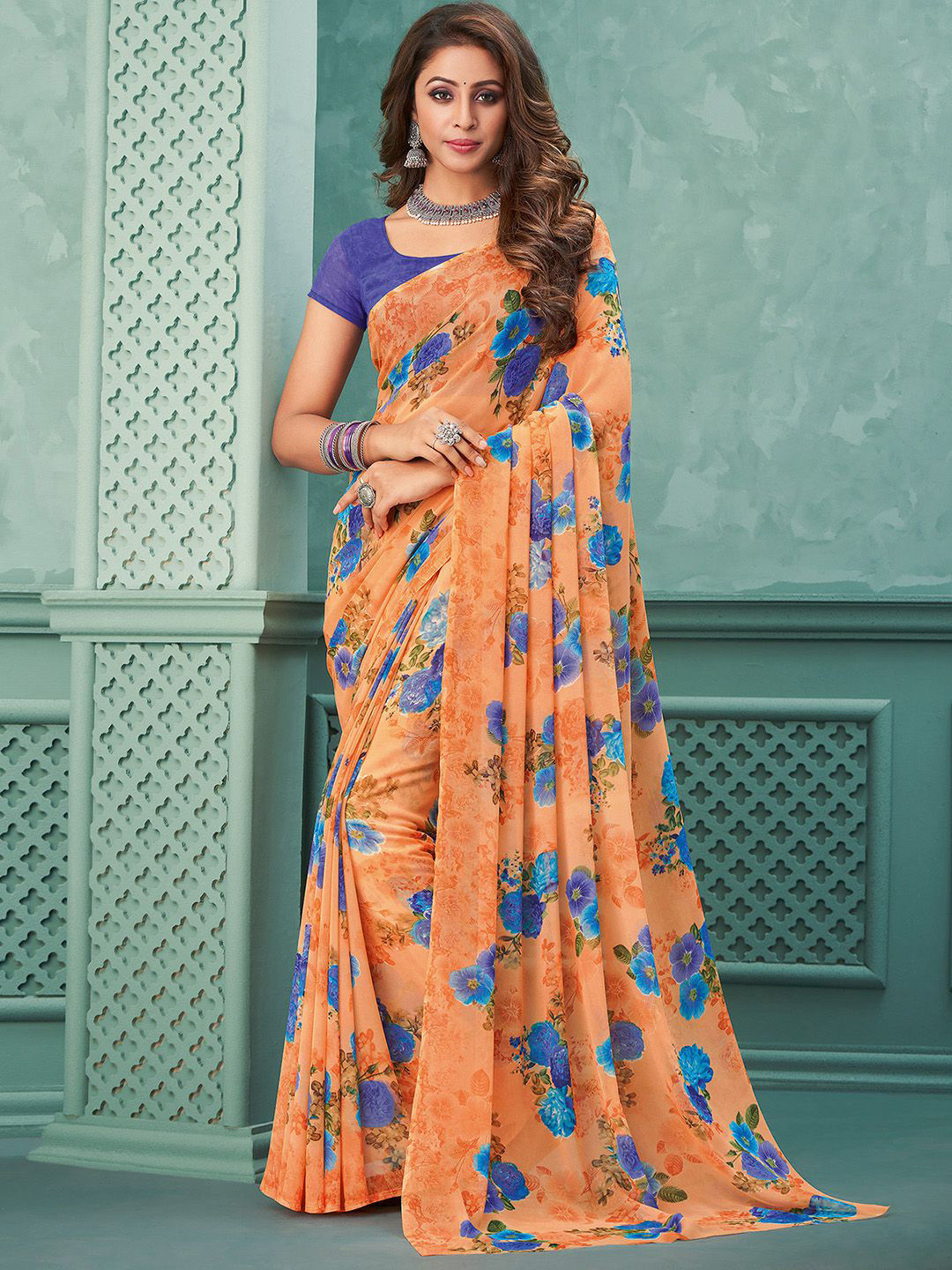 

Mitera Orange & Blue Floral Printed Poly Georgette Saree
