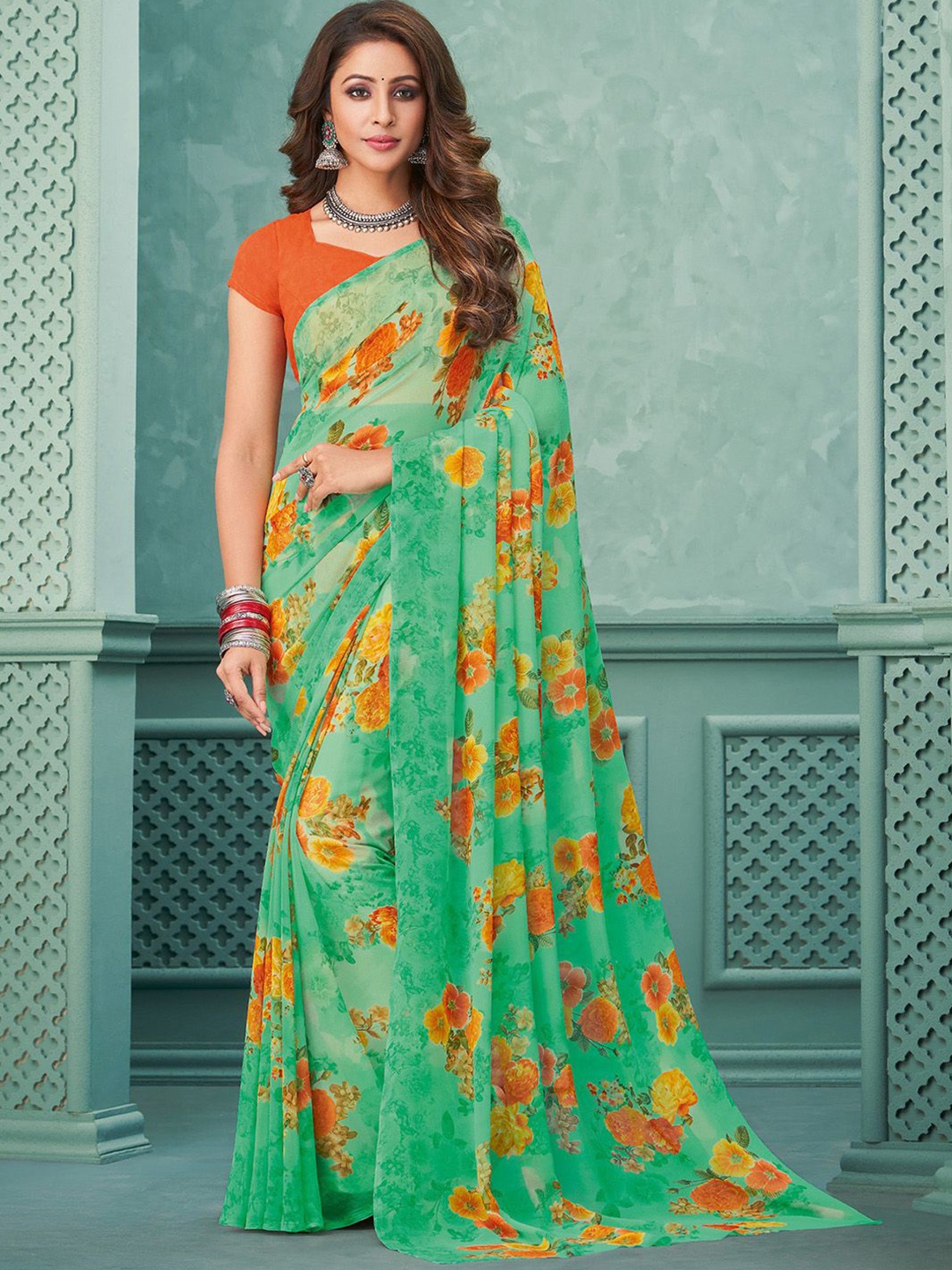 

Mitera Green & Orange Floral Printed Poly Georgette Saree