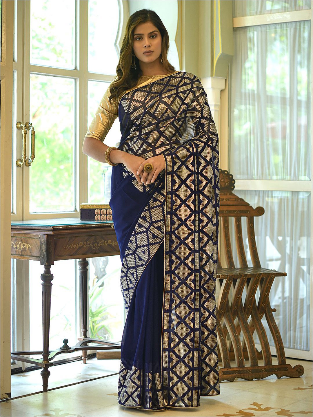 

Satrani Blue & Gold-Toned Geometric Embellished Saree