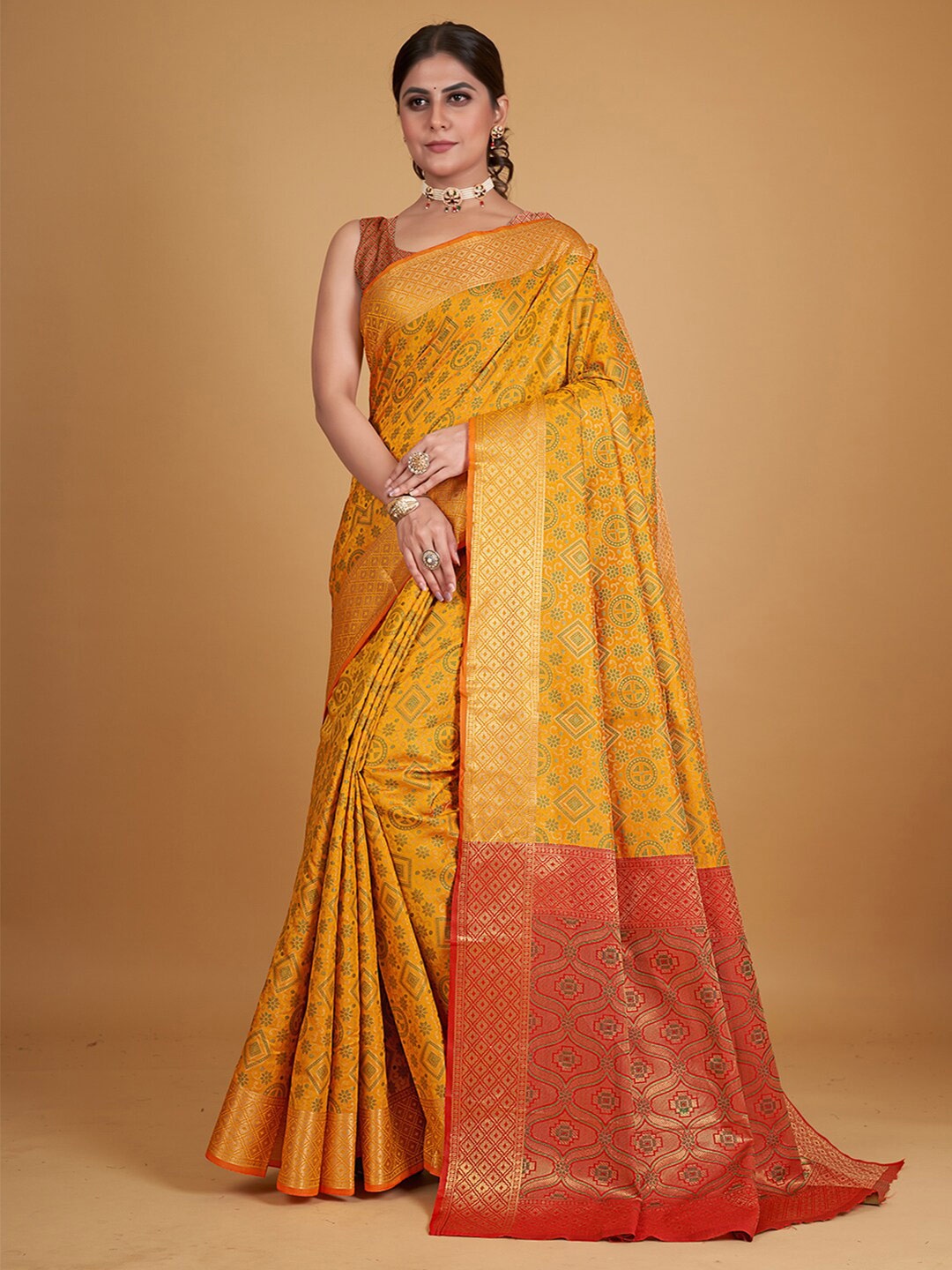 

Pisara Ethnic Motifs Woven Design Zari Silk Cotton Patola Saree, Mustard