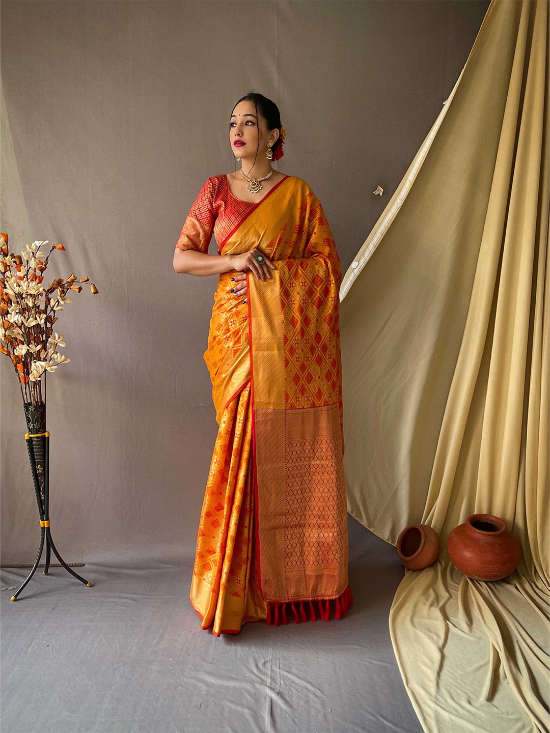 

Mitera Orange & Red Ethnic Motifs Woven Design Zari Silk Blend Banarasi Saree