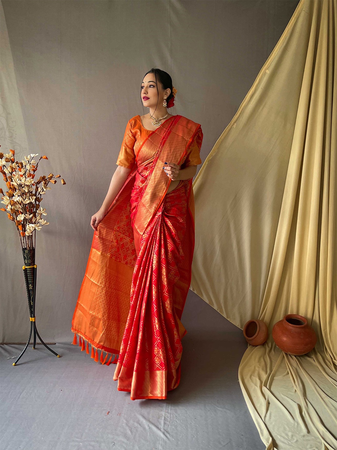 

Mitera Red & Gold-Toned Ethnic Motifs Woven Design Zari Silk Blend Patola Saree