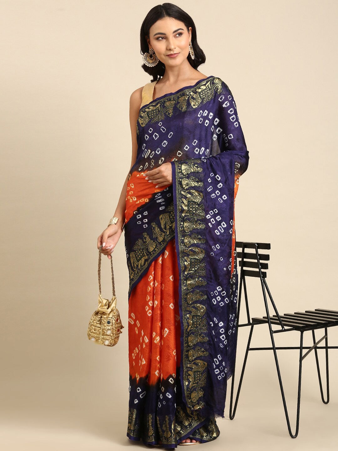 

Anouk Orange & Navy Blue Bandhani Printed Zari Saree