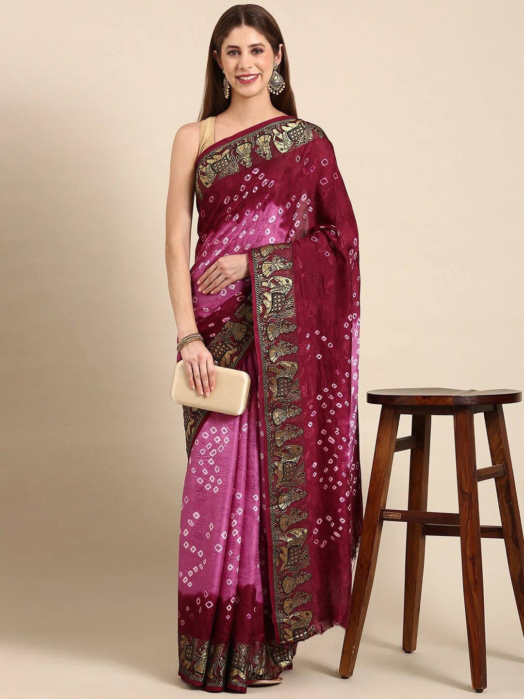 

Anouk Burgundy & Pink Bandhani Printed Saree