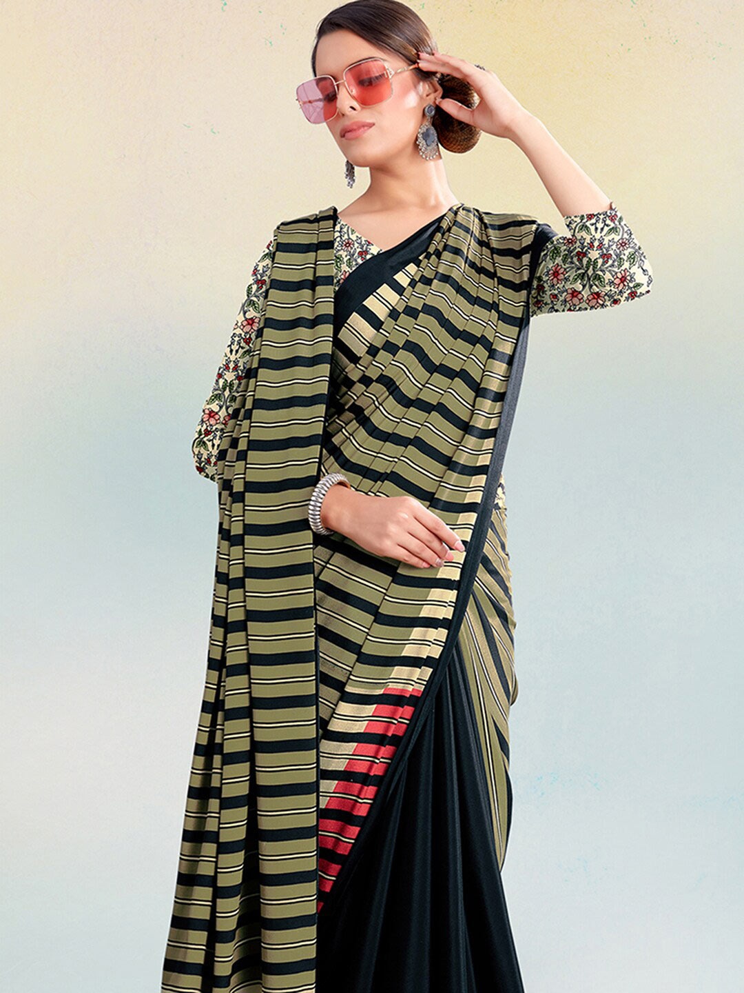 

Satrani Green & Black Striped Half and Half Saree