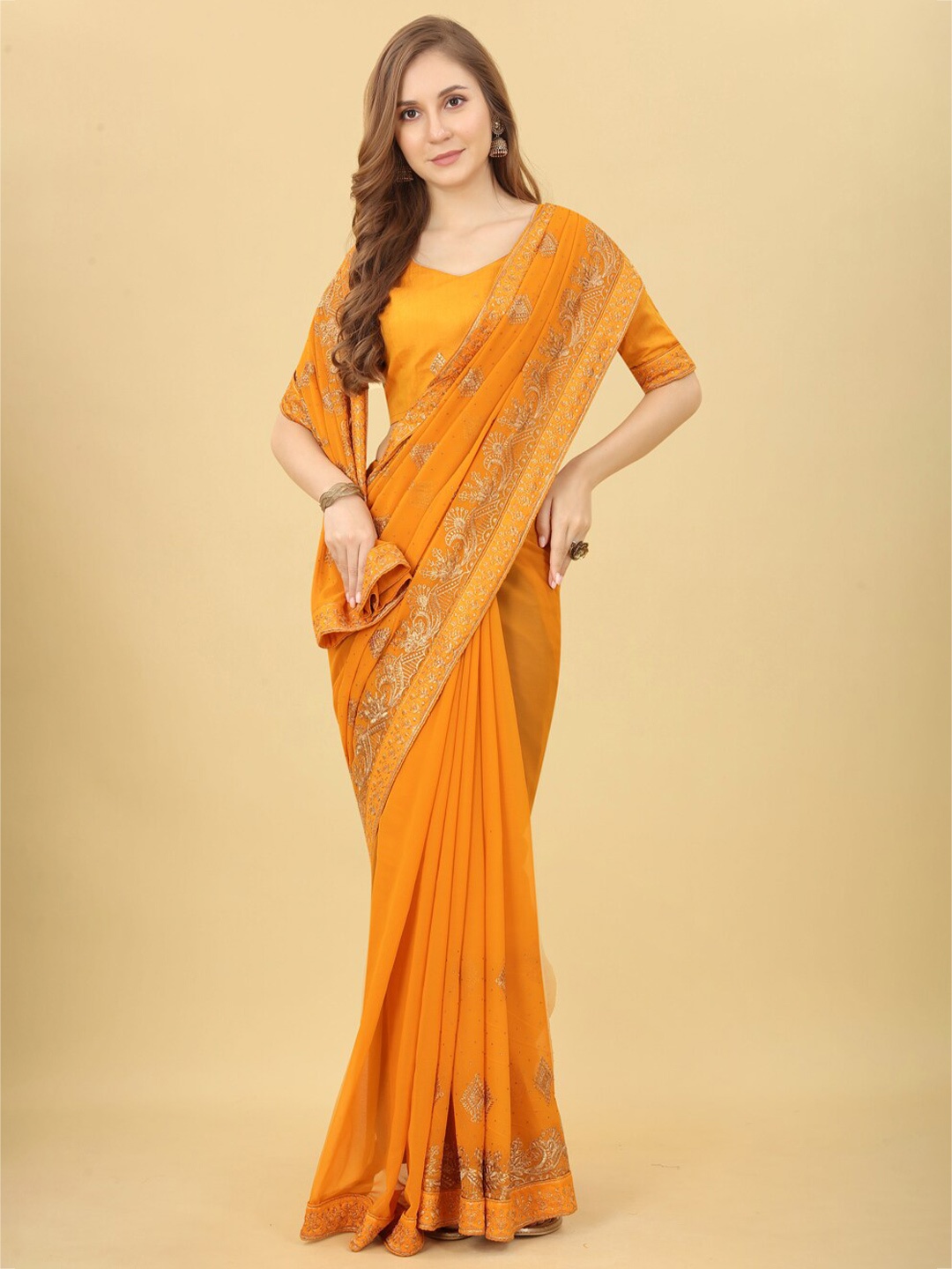 

VILLAGIUS Ethnic Motifs Embroidered Pure Georgette Saree, Mustard